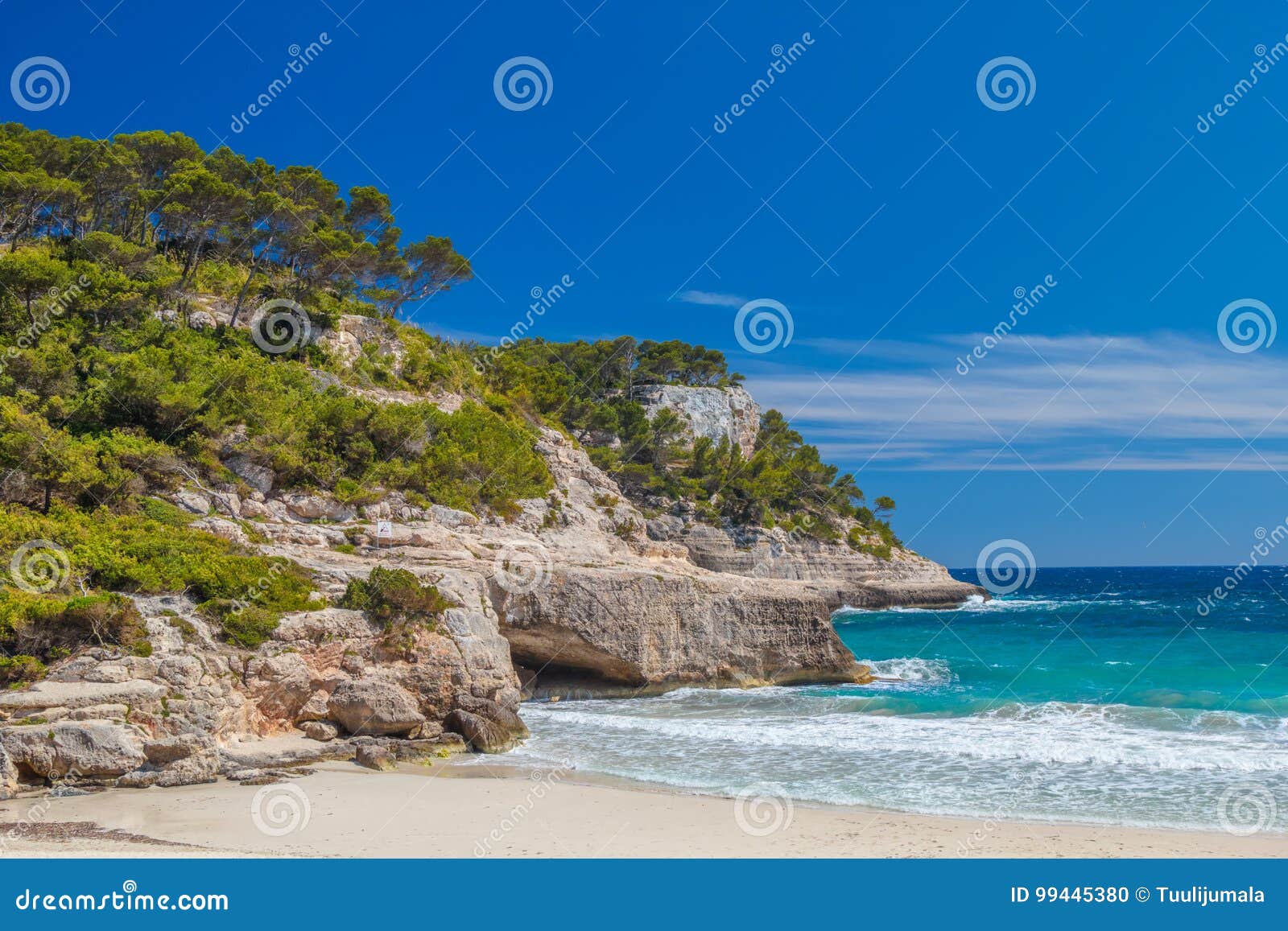 cala mitjana beach cliffs scenery