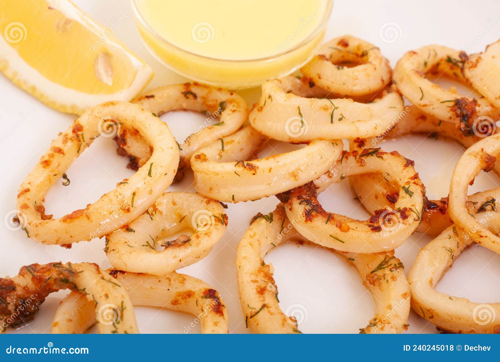 Calamari Rings, Squid Rings, with Sauce and Lemon Stock Photo Image