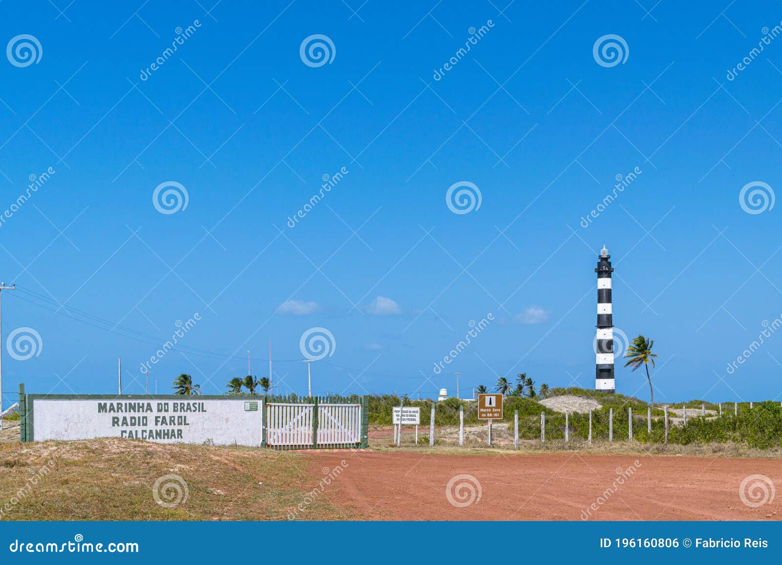 the calcanhar lighthouse and the beginning of the br-101, the largest highway in brazil.