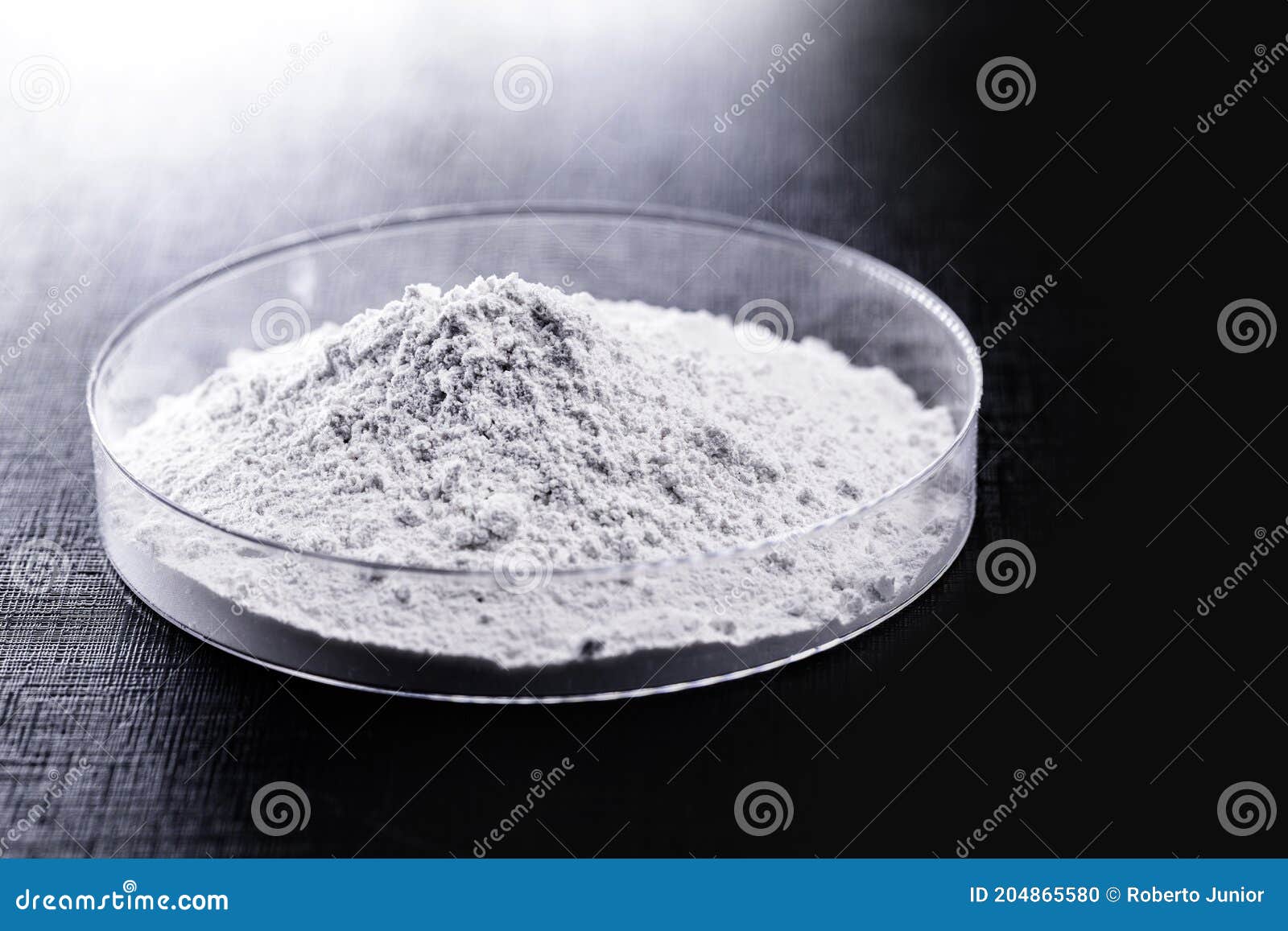 calcium carbonate  the result of the reaction of calcium oxide with carbon dioxide. being prepared in petri dish