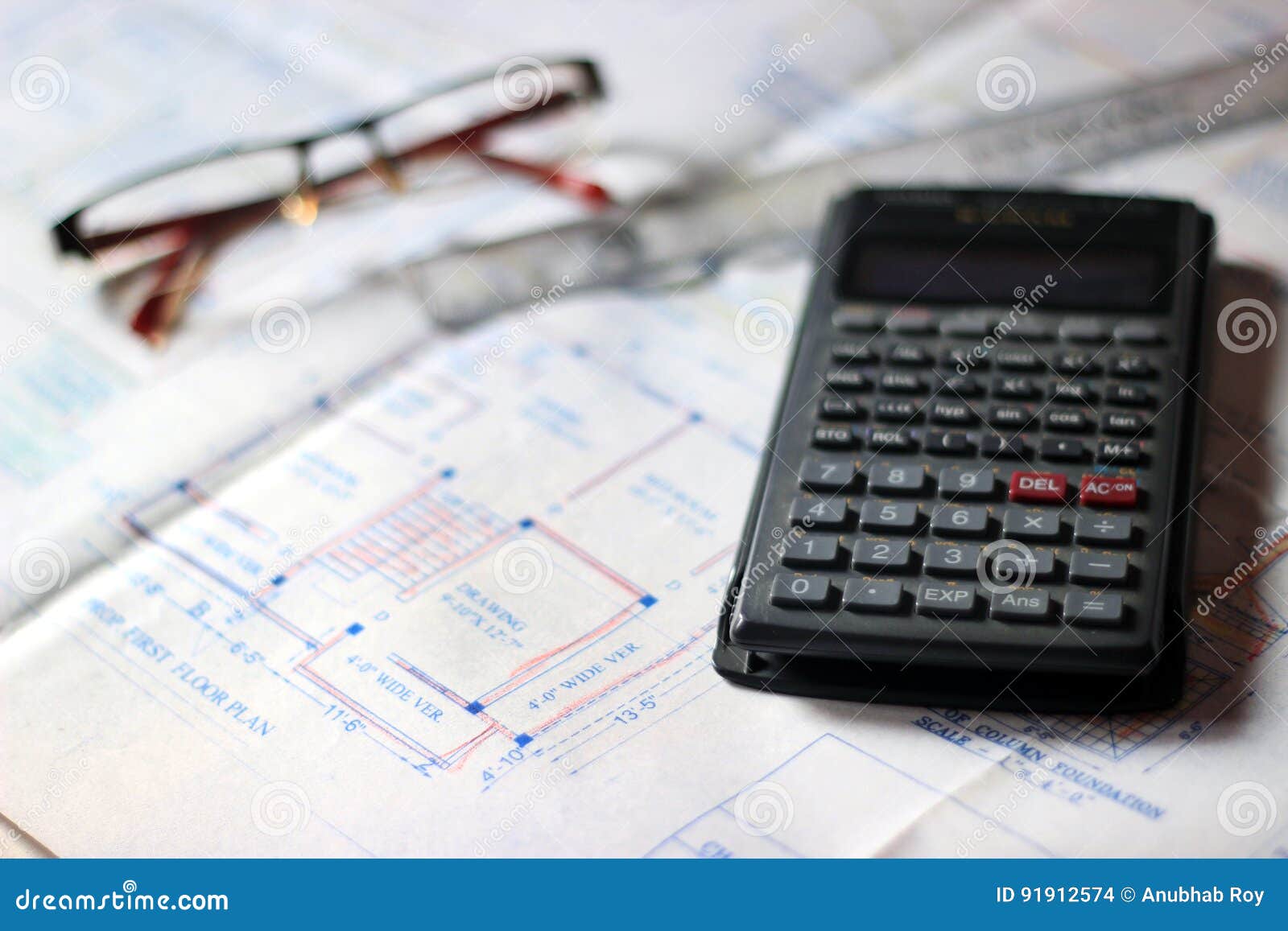 Calculator and Building Plans. Stock Photo Image of architecture