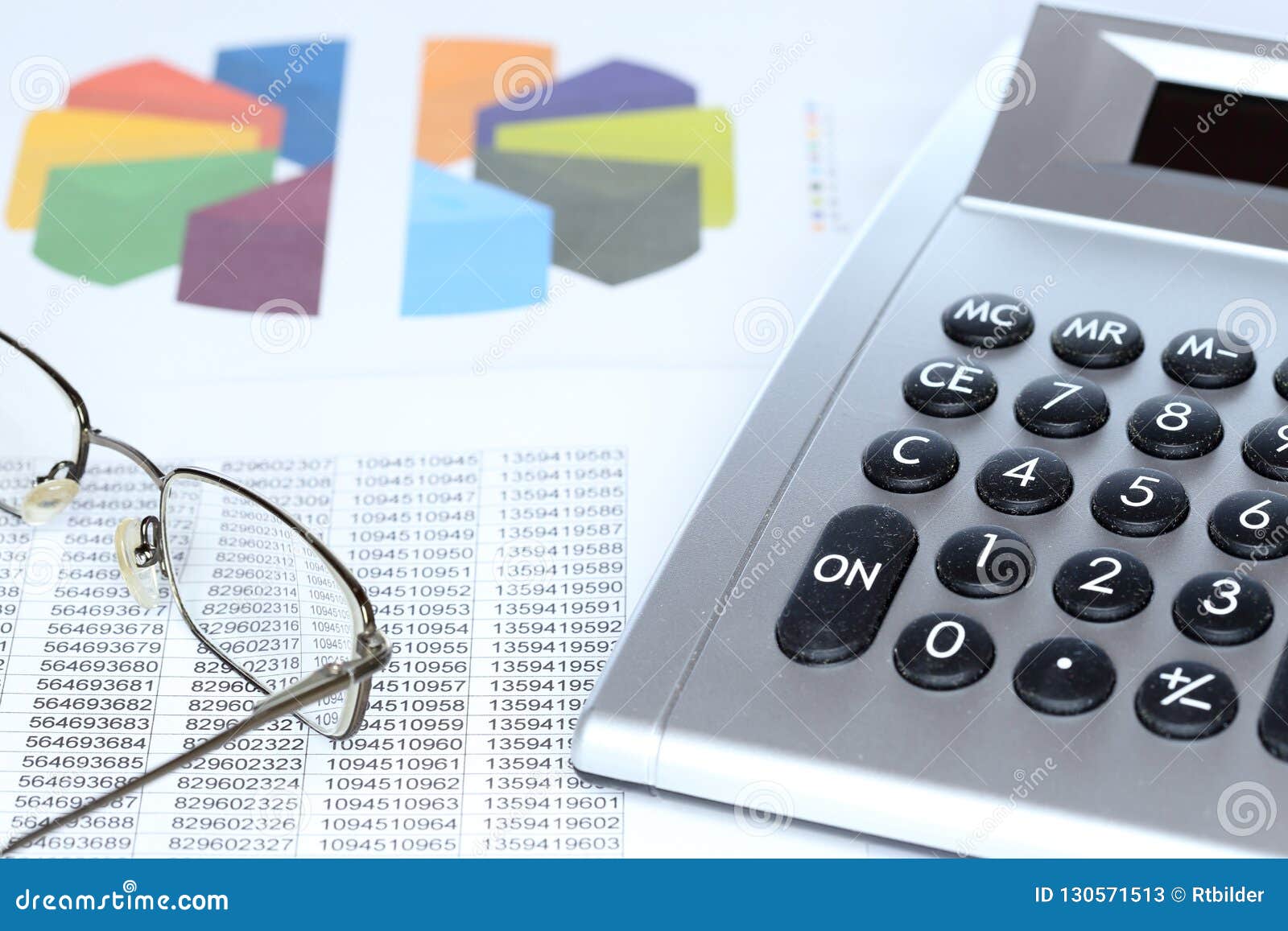 Calculator and Chart with Eyeglasses Stock Image Image of earnings, paper 130571513