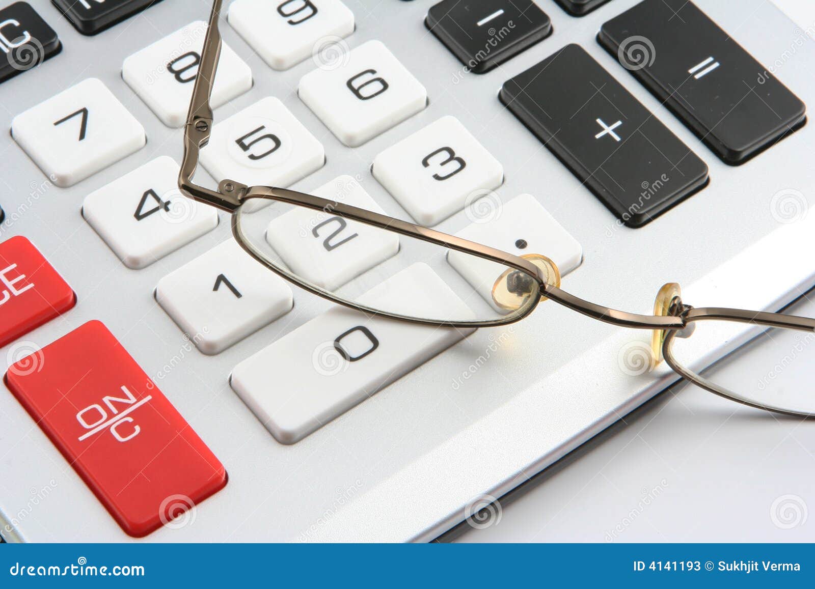 Calculator and glasses stock image. Image of business 4141193