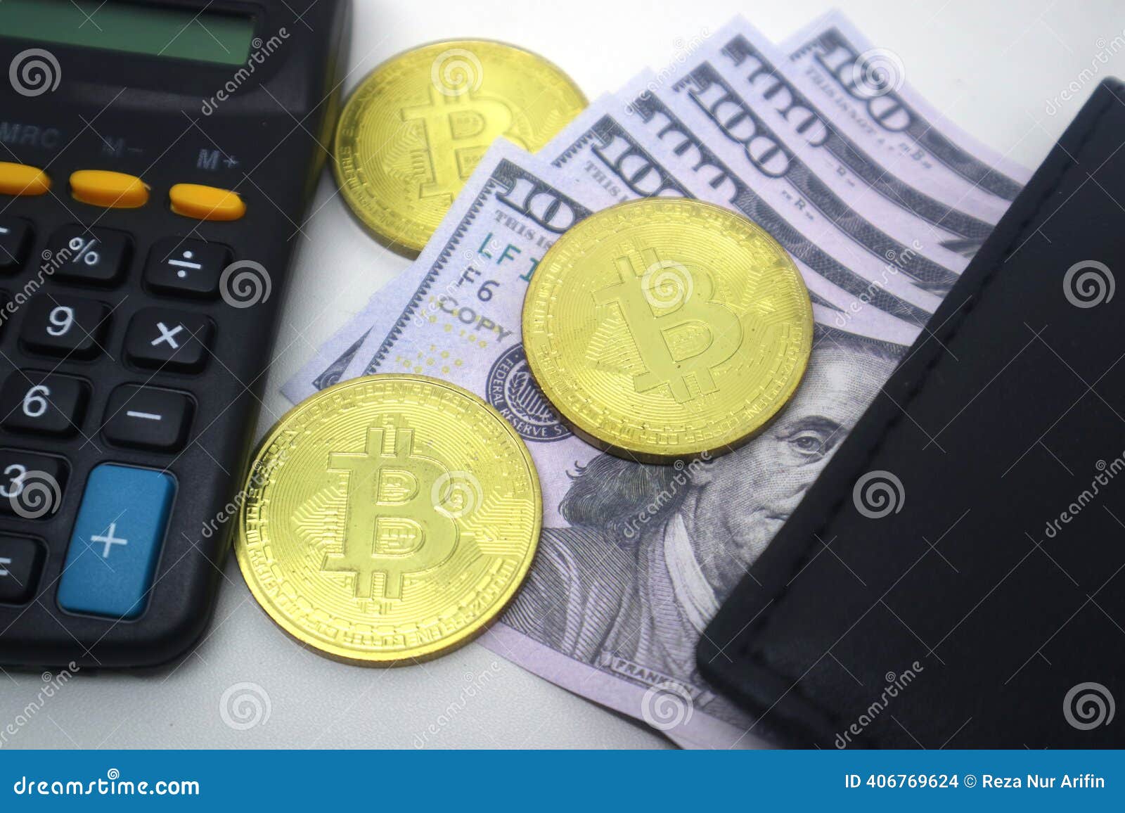 A Calculator, Three Gold Bitcoin Coins, US $100 Bills, and a Black Wallet  Stock Photo - Image of trading, wealth: 406769624