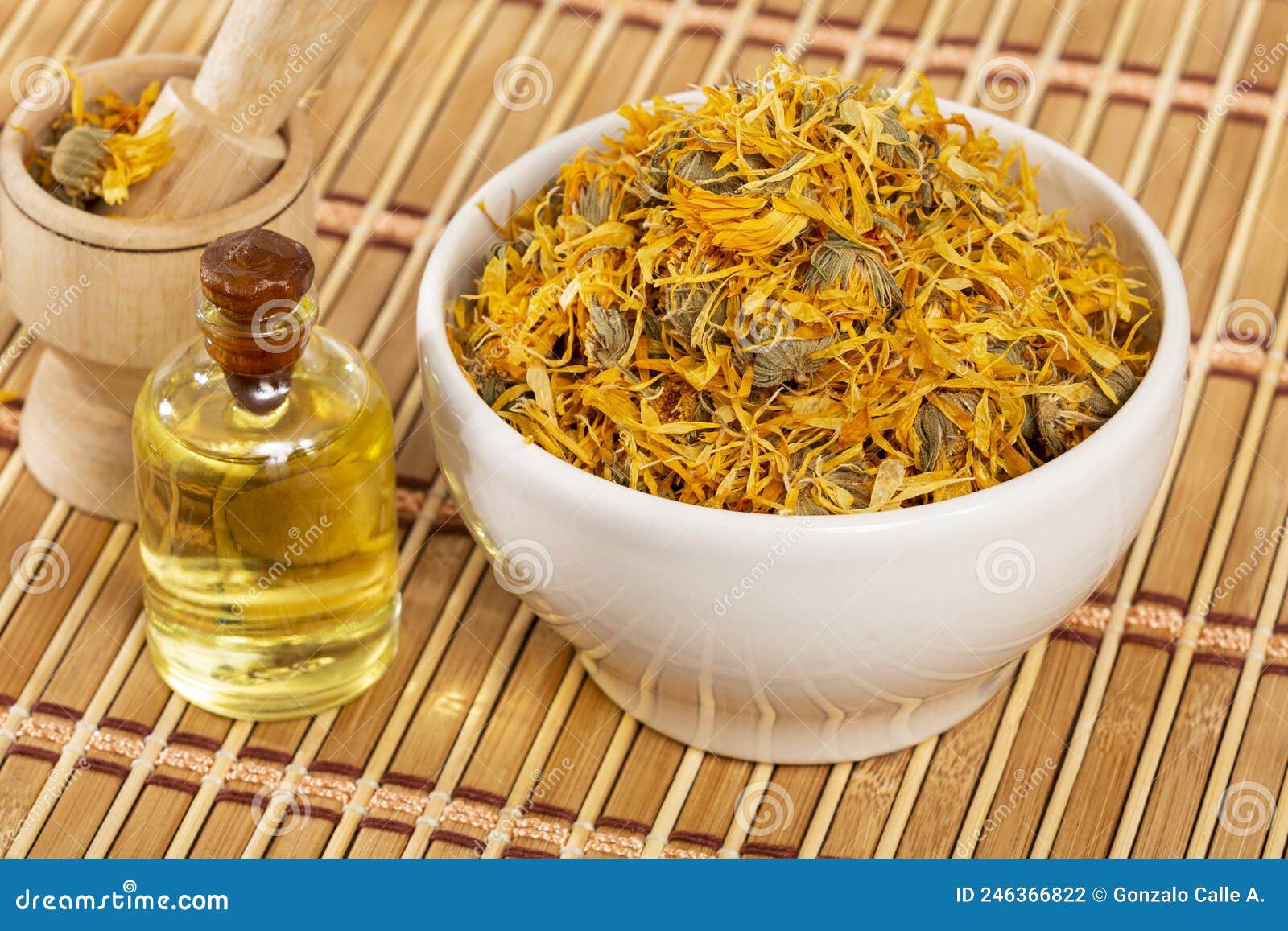 calendula officinalis - calendula oil in a glass bottle