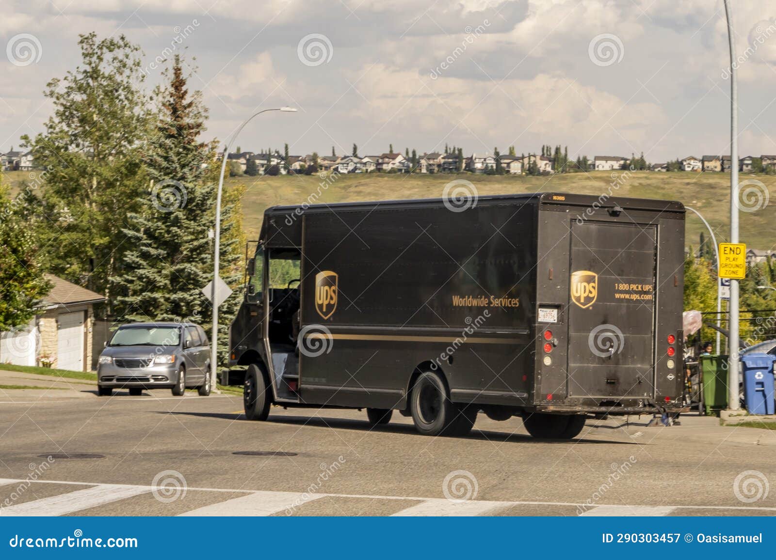 An UPS Delivery Truck on the Route during Fall Editorial Photography
