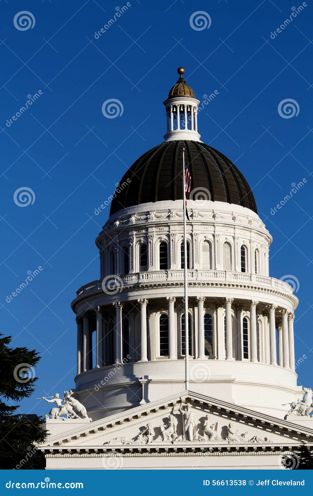 California State Capitol Building Dome Against Blue Sky Stock Photo