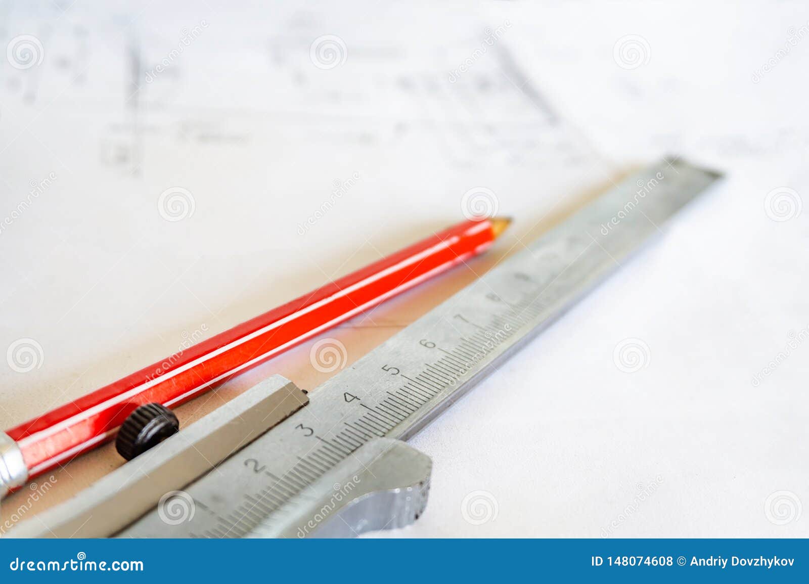 Caliper and Red Pencil are on the Drawing, after the Technical Project