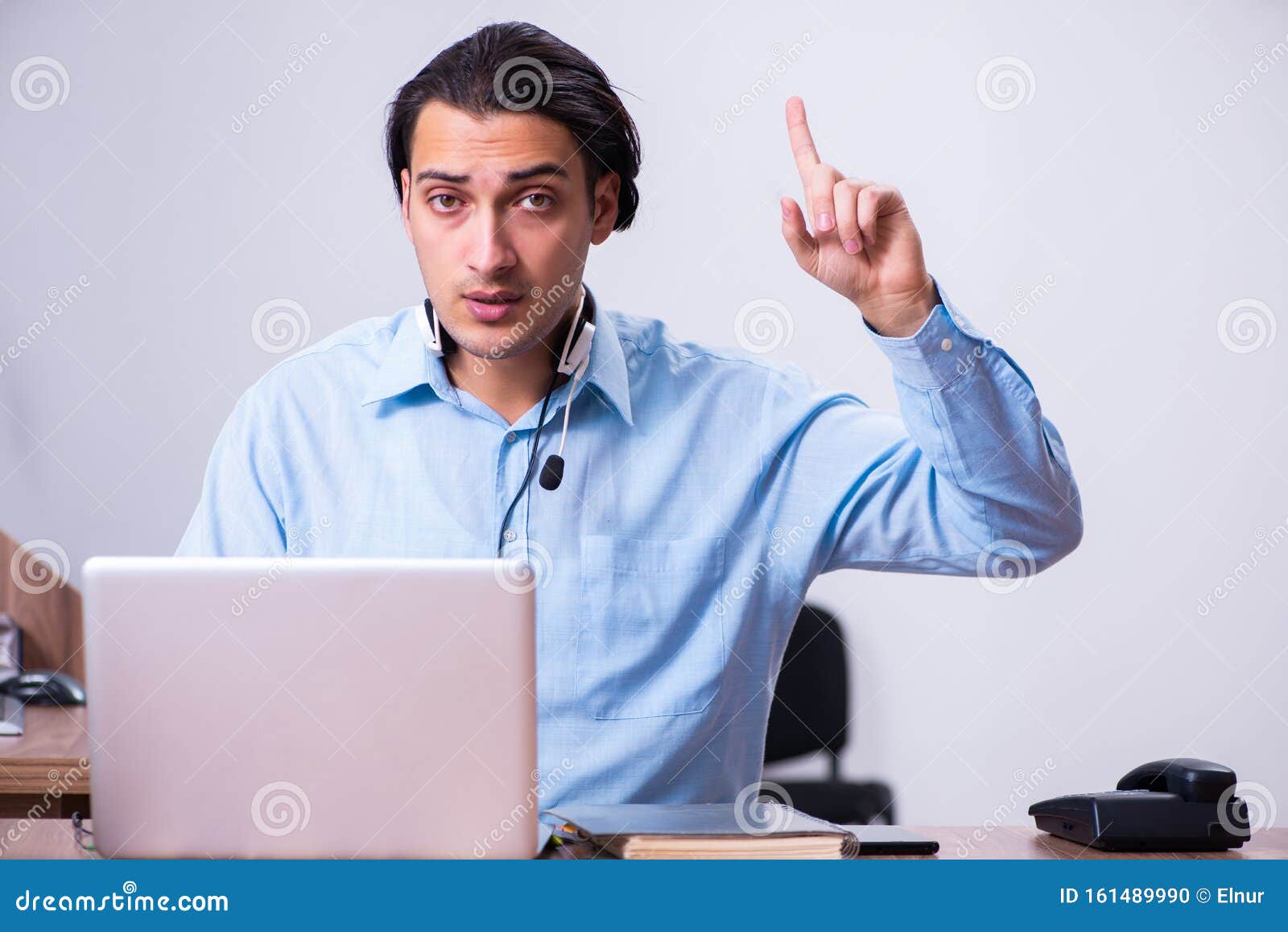 Call Center Operator Working at His Desk Stock Photo Image of caution