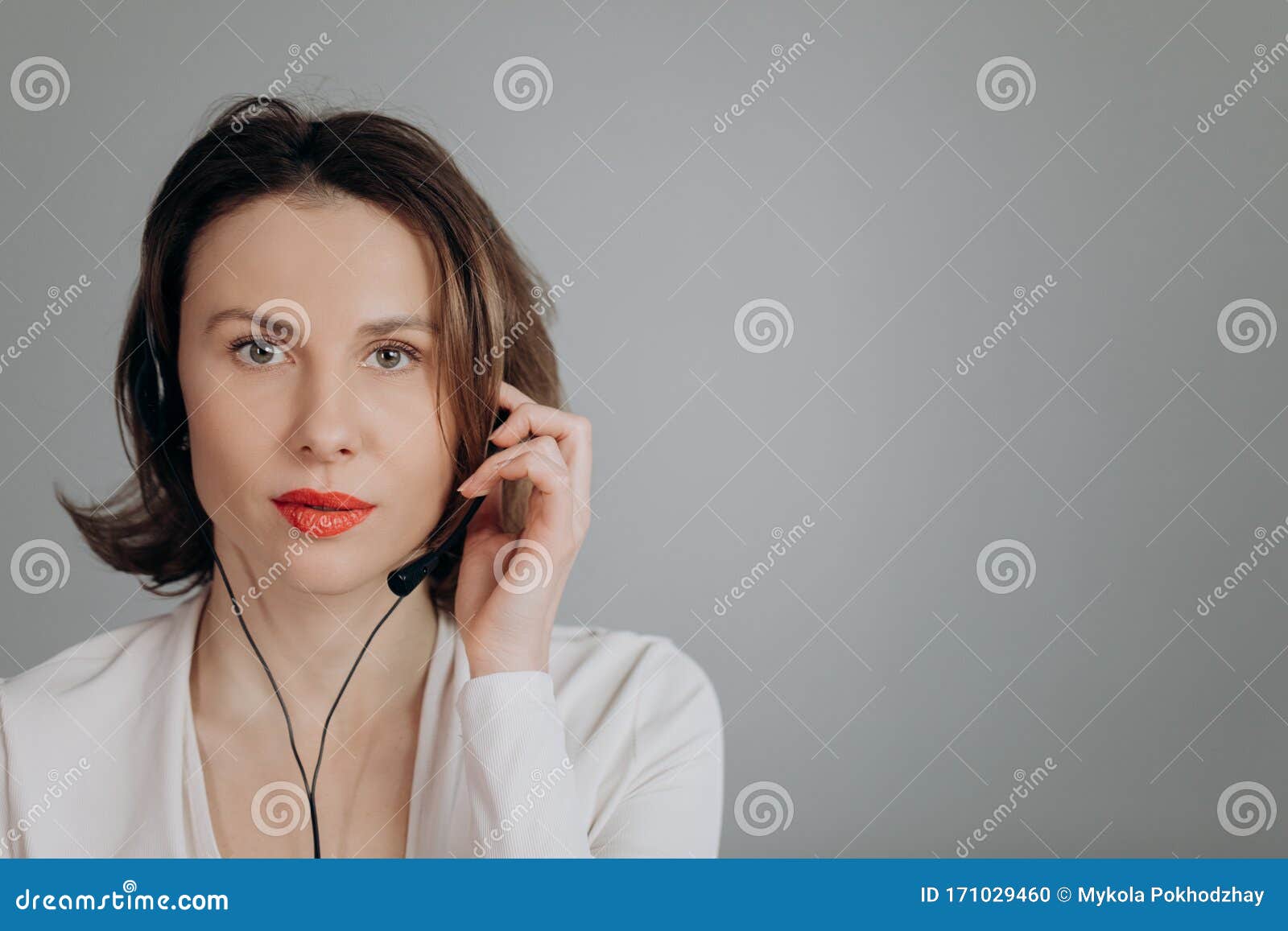 Call Centre Agent Talking with Their Headset in a Bright Office. Call ...