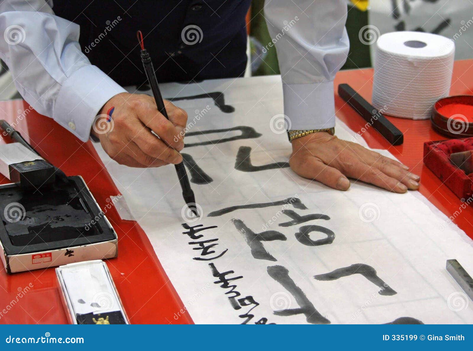 calligraphy teacher writing