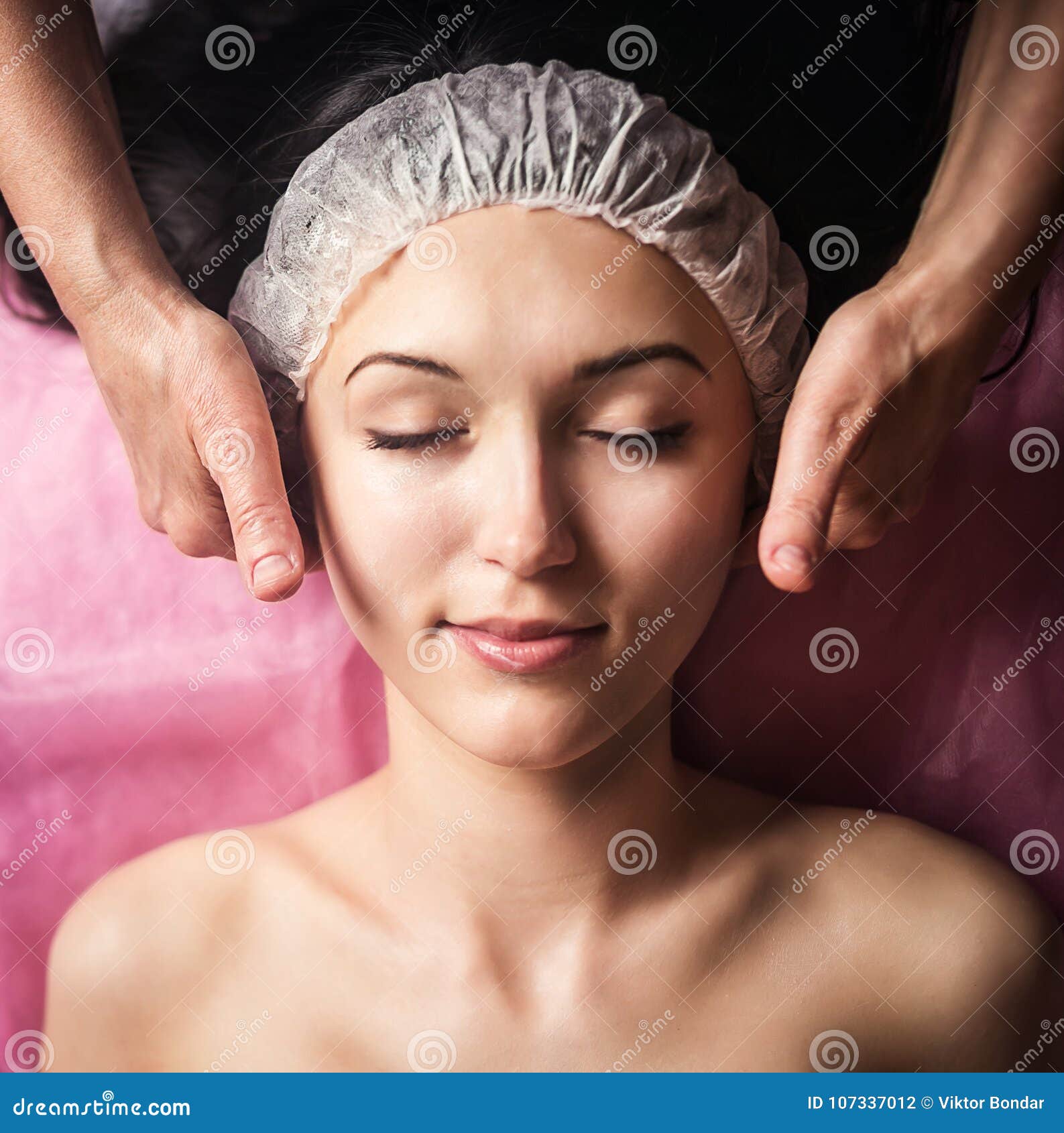 Calm Girl Having Spa Facial Massage In Luxurious Beauty Salon Stock