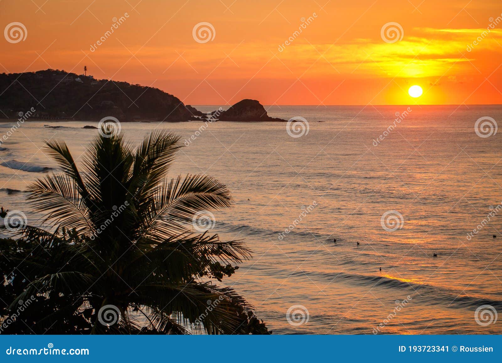 calm sunset scene of zipolite beach in southern mexico