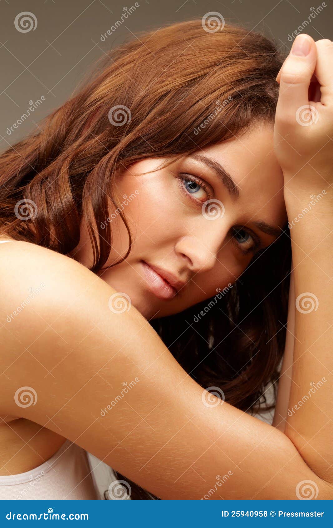 Calm woman. Portrait of feminine woman looking at camera