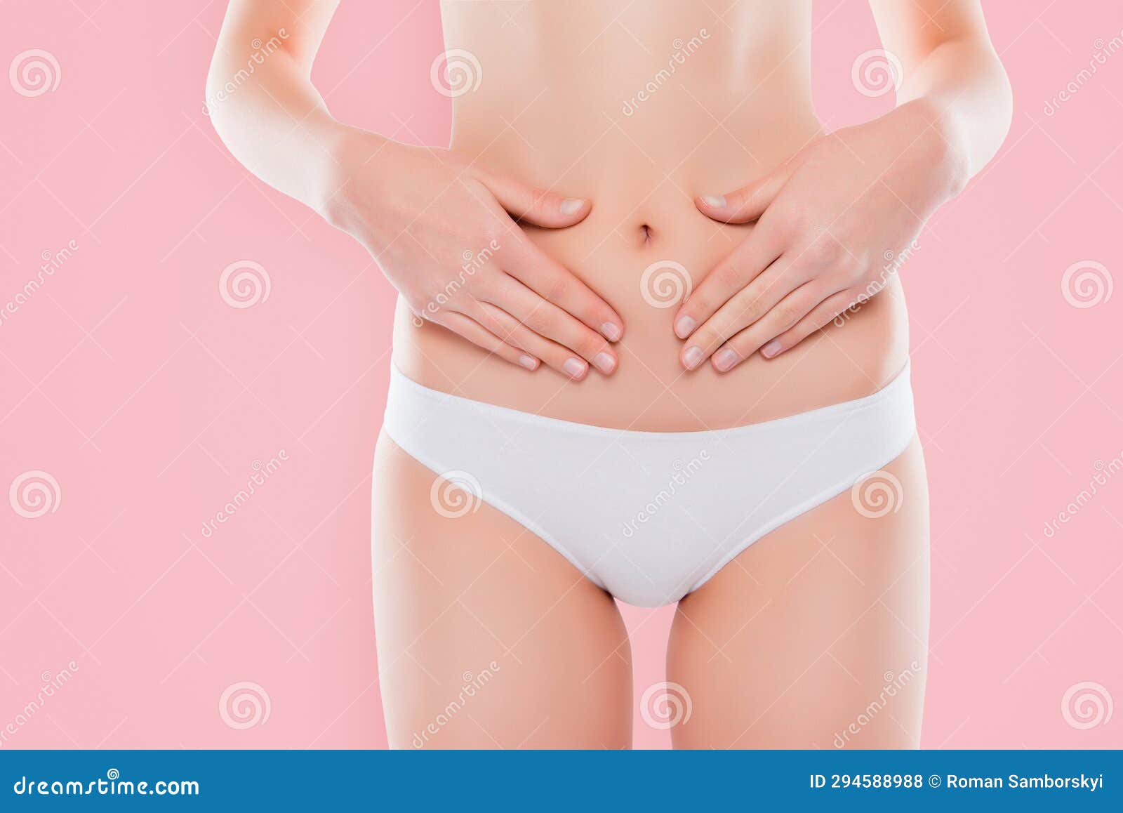 Woman in Underwear Touching Her Belly on White Background, Closeup