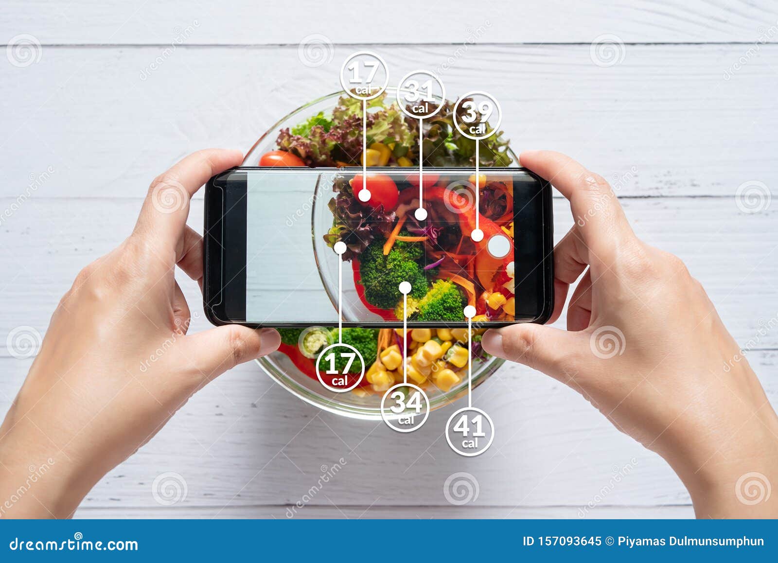 calories counting and food control concept. woman using application on smartphone for scanning the amount of calories in the food
