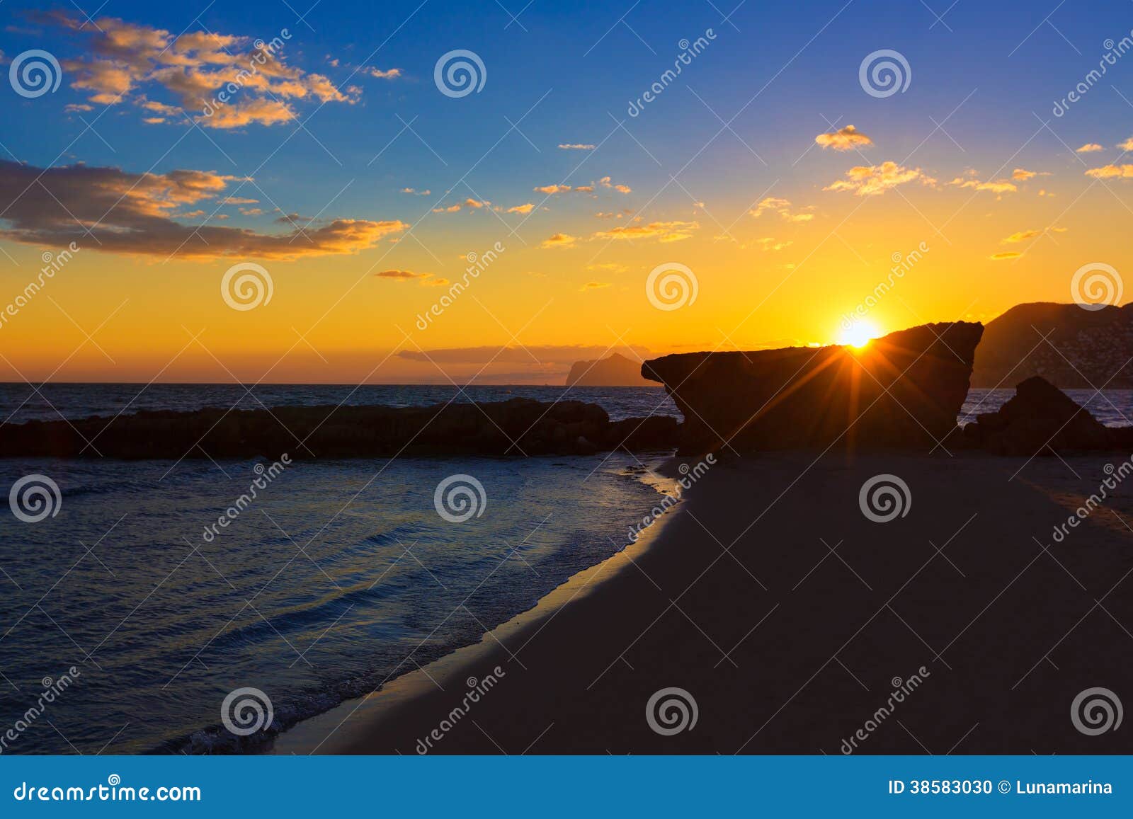 calpe alicante sunset at beach cantal roig