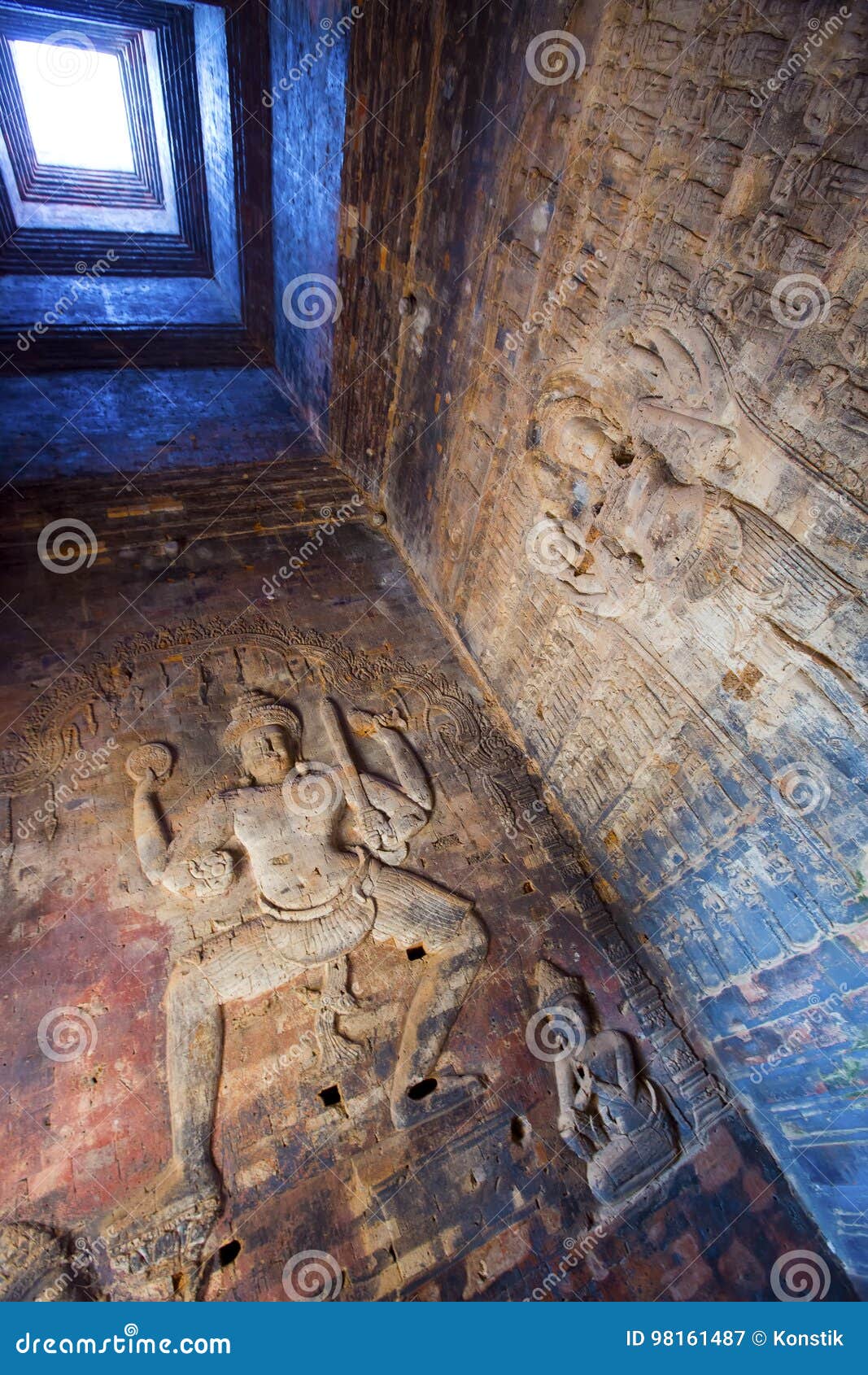 cambodia. siem reap. carved stone patterns on temple walls banteay srey xth century, inside view