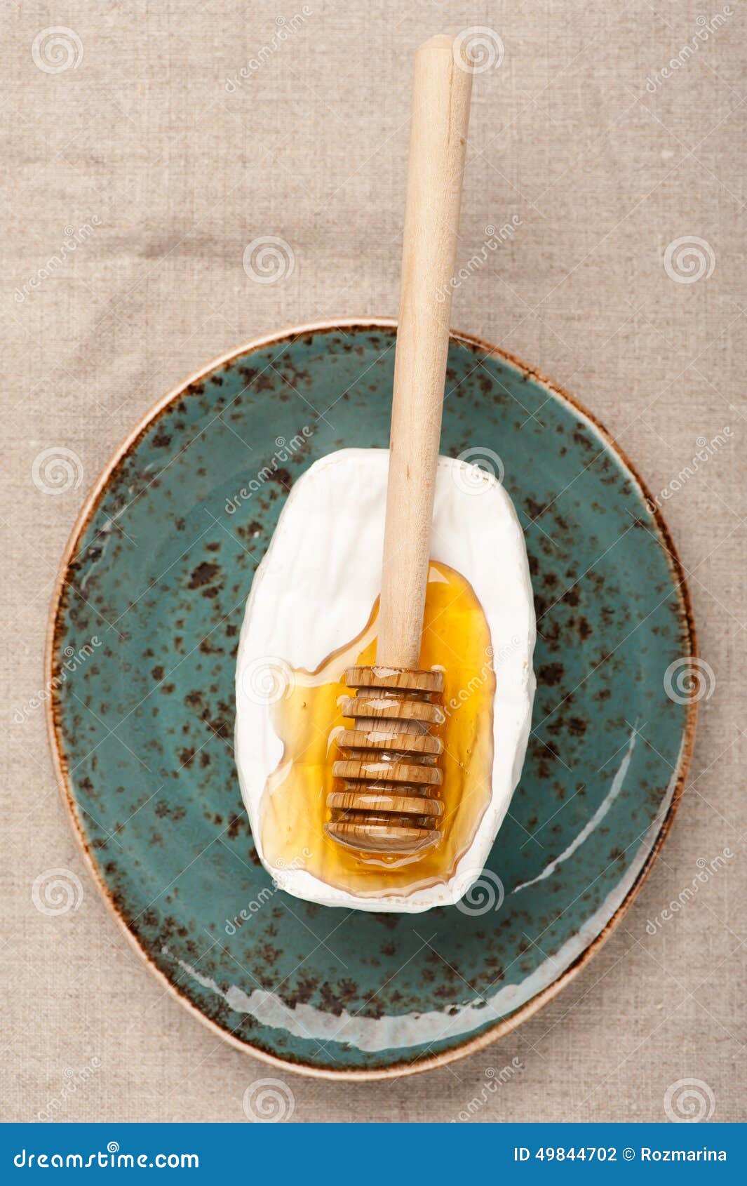 Camembert cheese and honey stock photo. Image of cheese 49844702