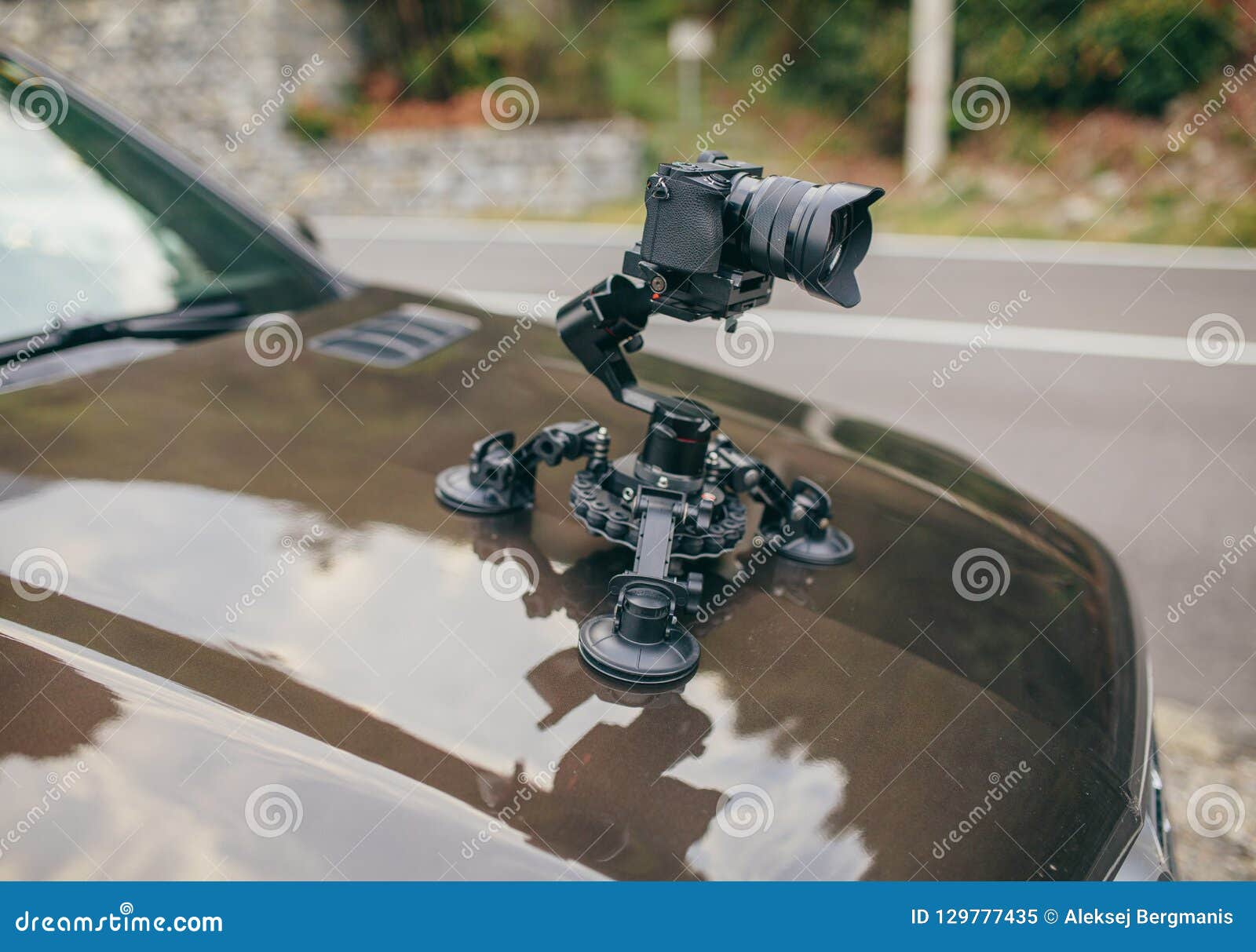 Camera Gimbal on the Car Steadicam Keeps on Suckers on the Auto Car