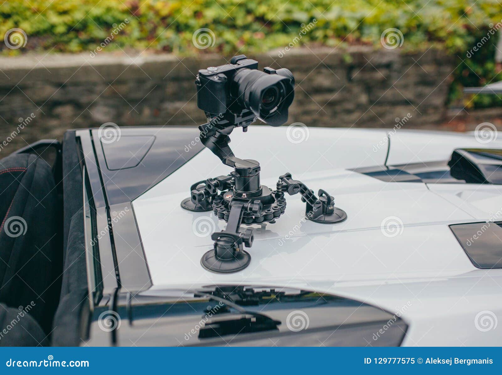 Camera Gimbal on the Car Steadicam Keeps on Suckers on the Auto Car