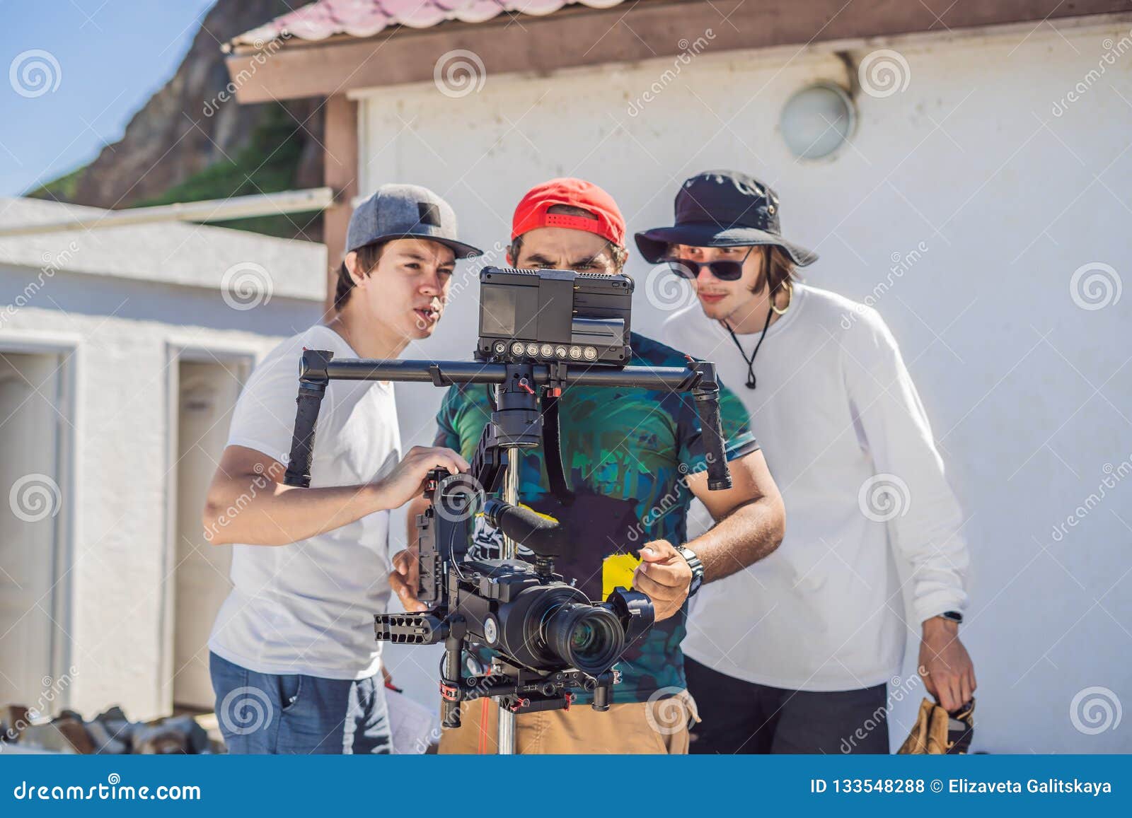 Camera Operator, Director and Dp Discuss the Process of a Commercial