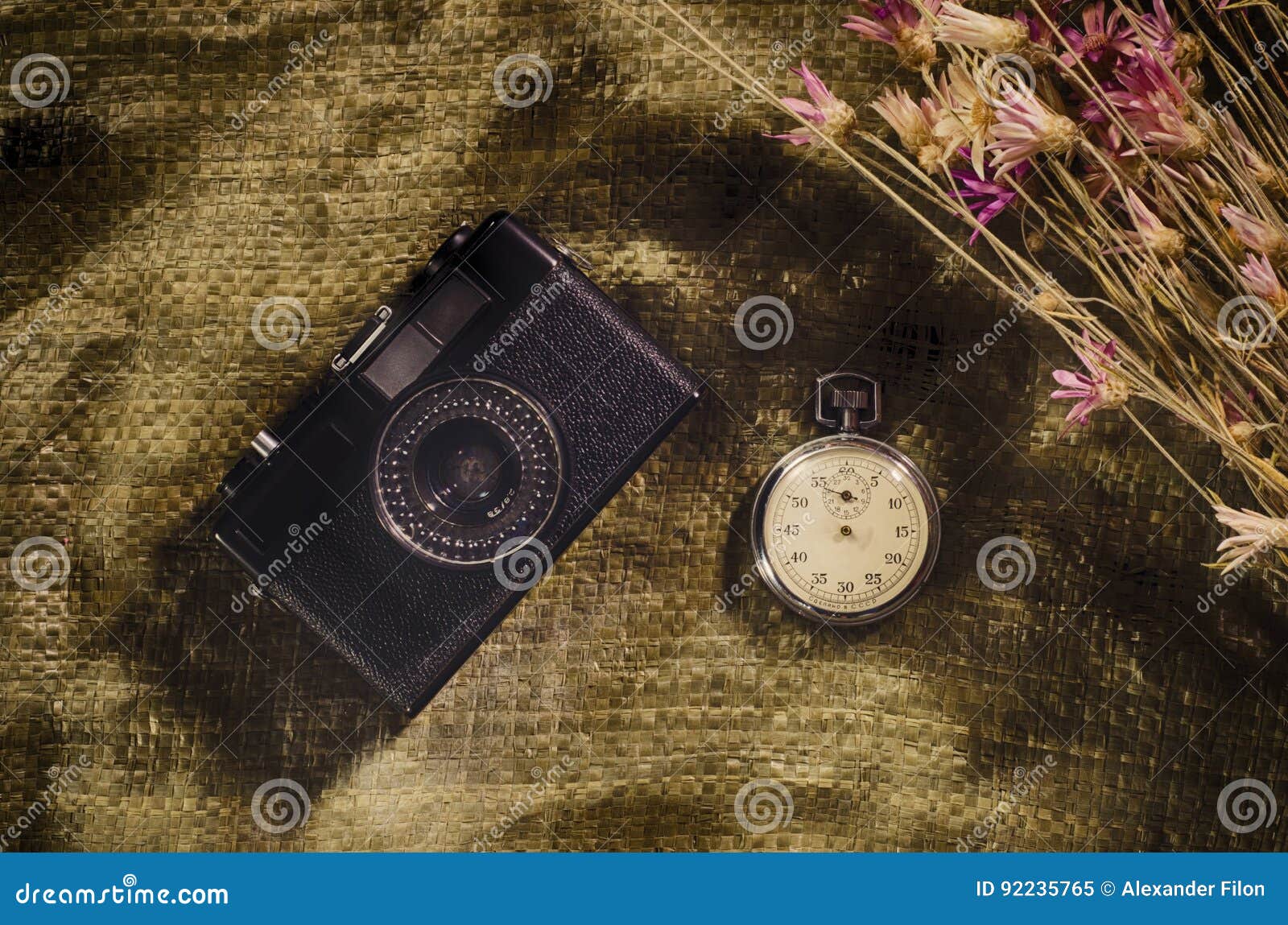 Camera and stopwatch stock image. Image of brown, light 92235765