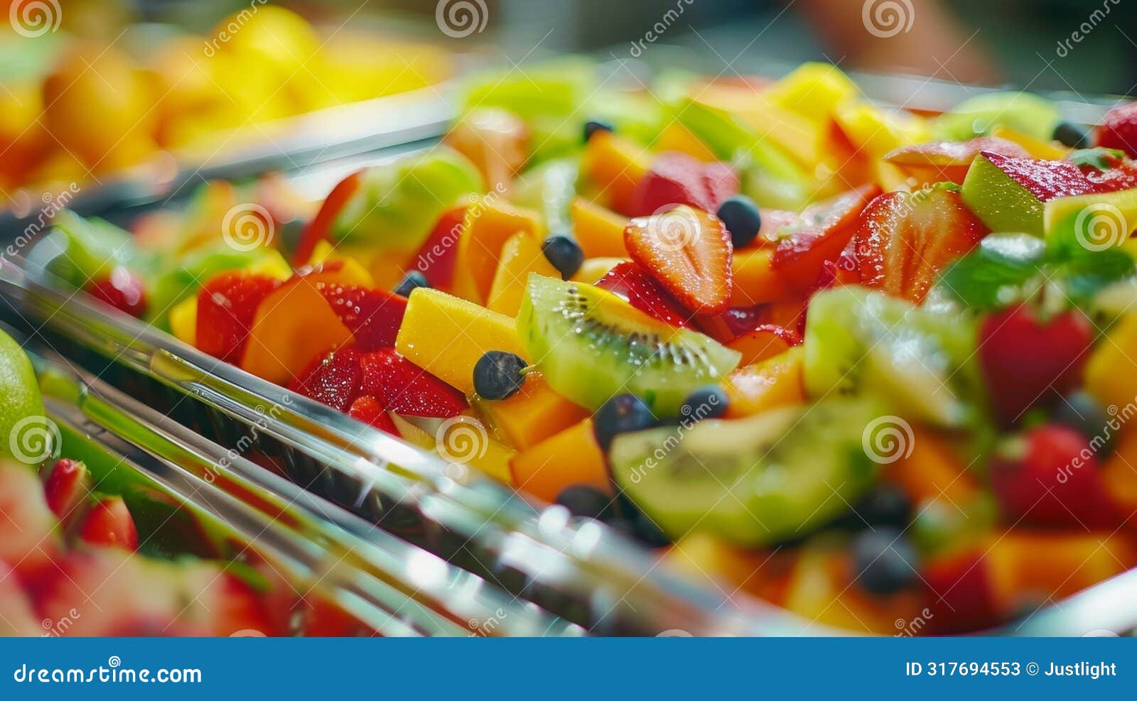 the camera zooms in on a tray of colorful and exotic fruits and veggies ready to be incorporated into the next dish