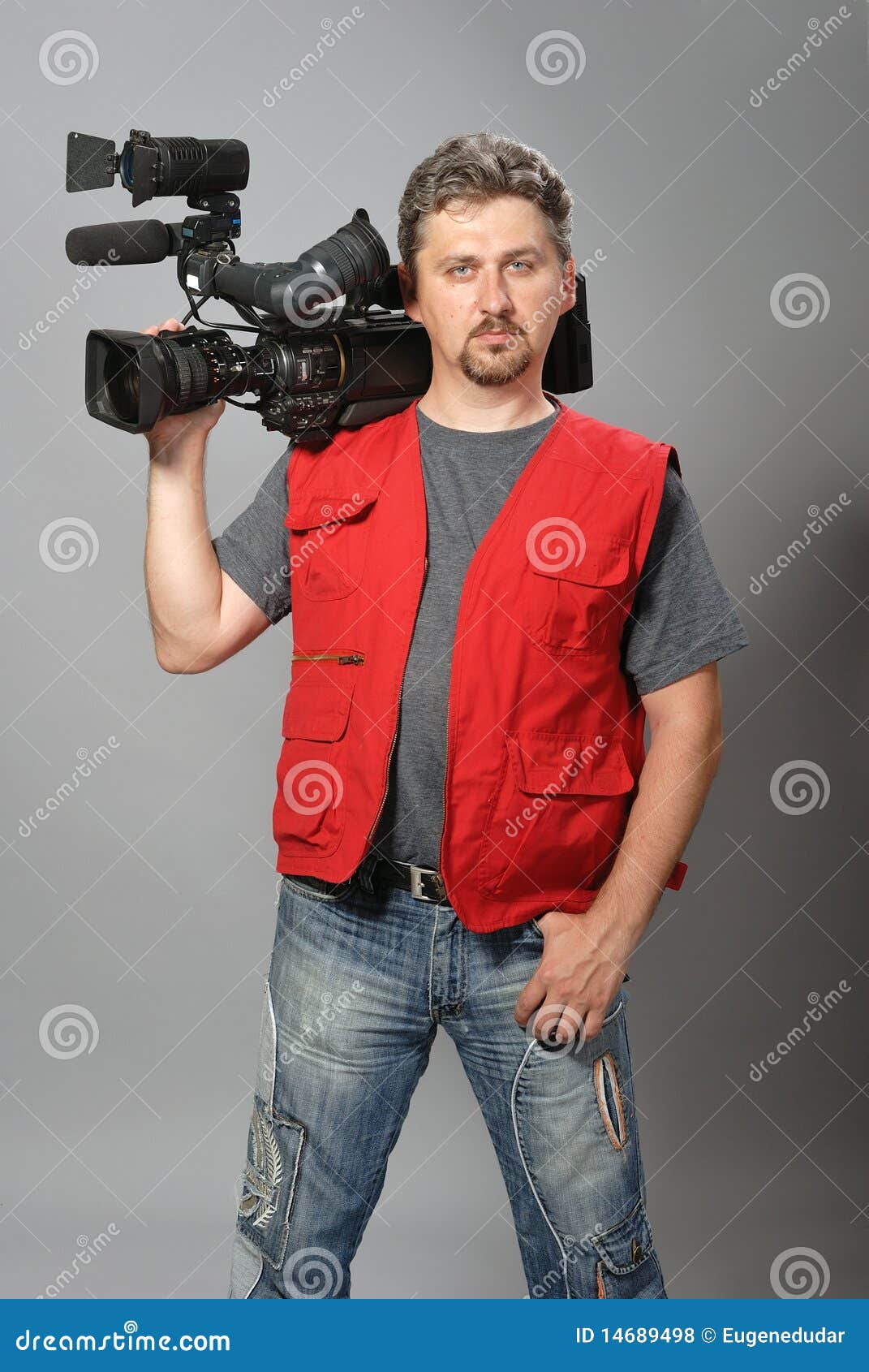 Cameraman in red vest stock photo. Image of cameraman 14689498
