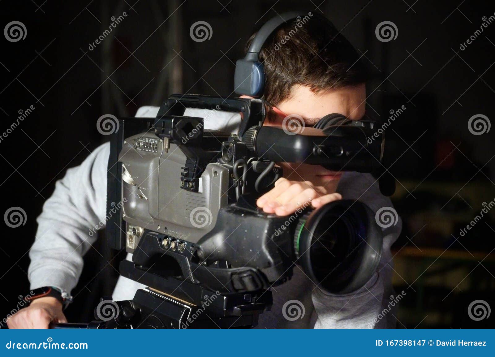 Cameraman Using Professional Digital Video Camera. Stock Image Image