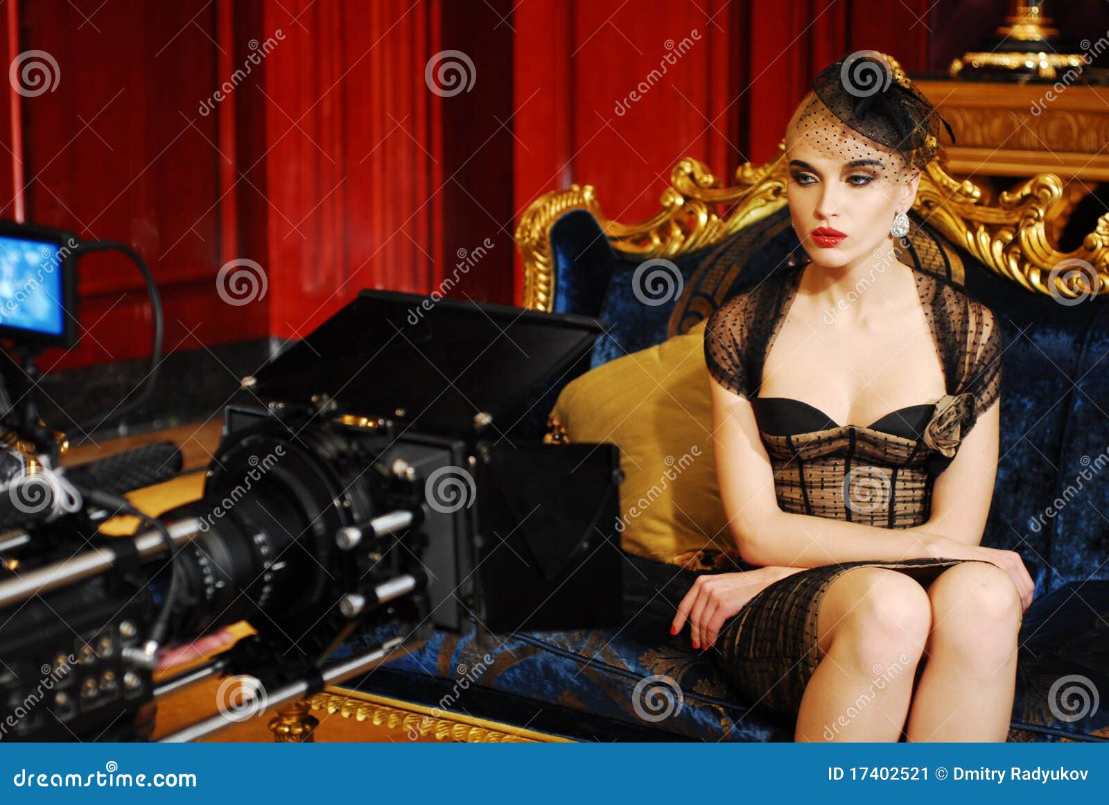 Camerman shooting film with beauty girl