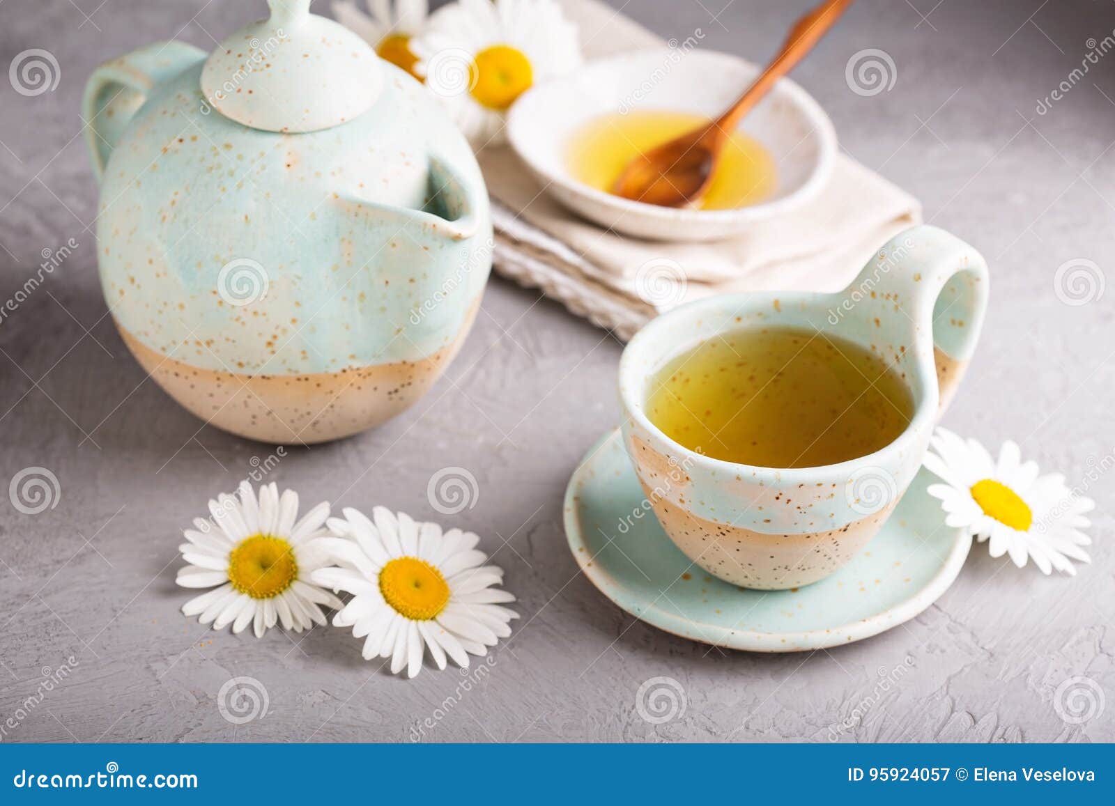 camomille tea in handmade ceramic cup