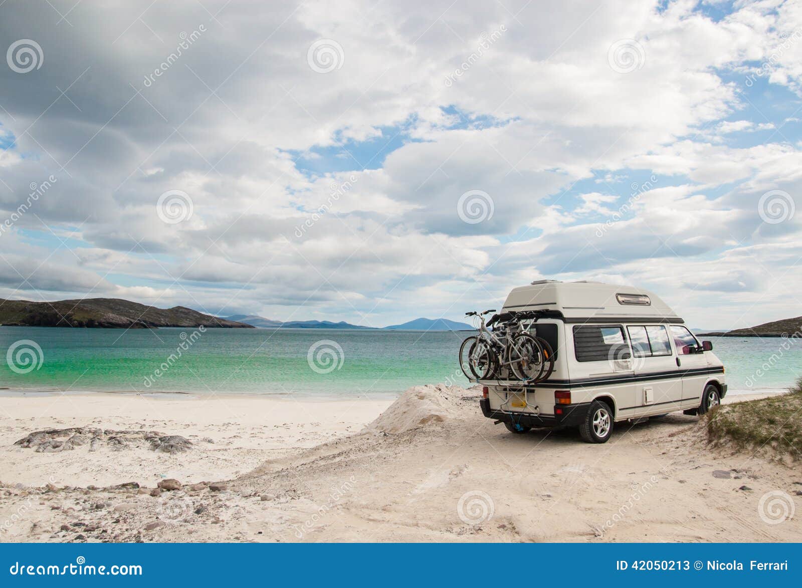 camper van parked on a beach in the isle of lewis