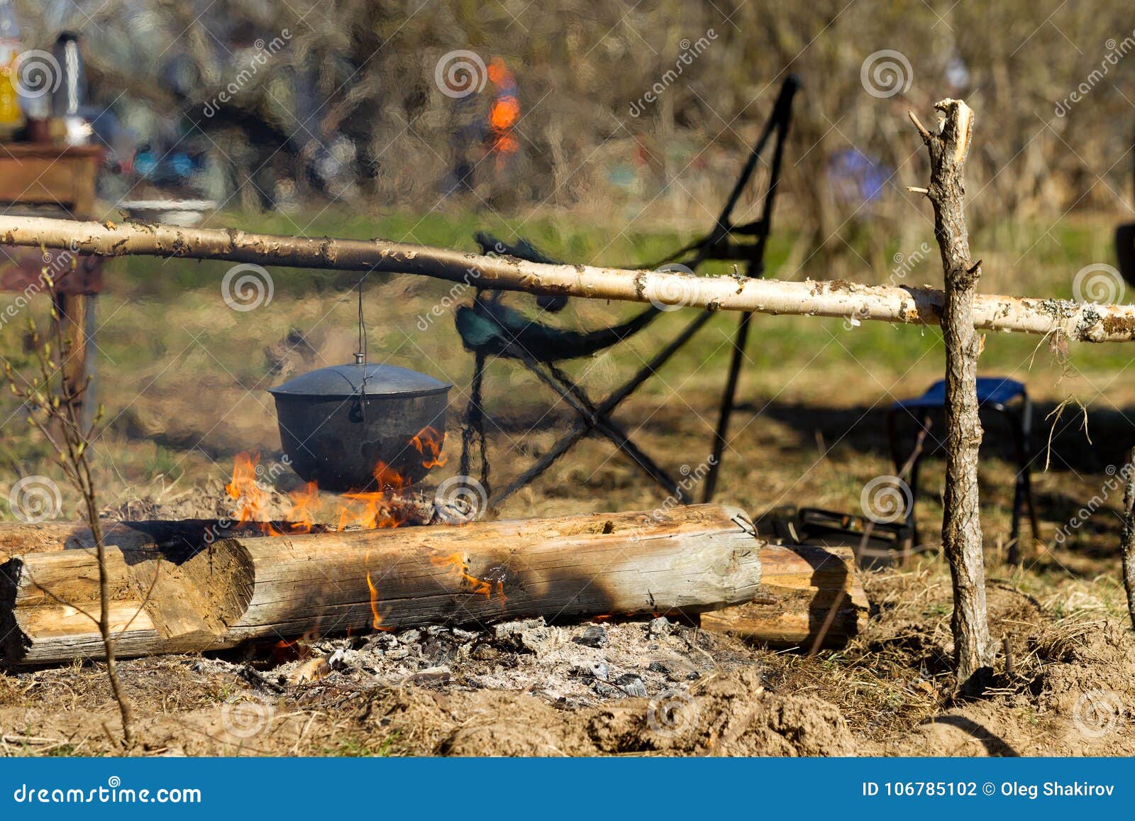 Campfire with a Cooking Pot Stock Photo Image of light, burning