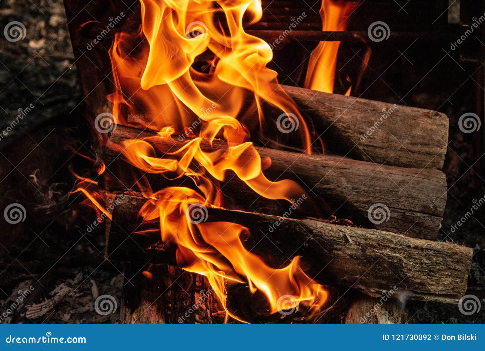 campfire-lighting-up-evening-nothing-better-than-camping-how-else-you-going-to-make-s-mores-121730092.jpg