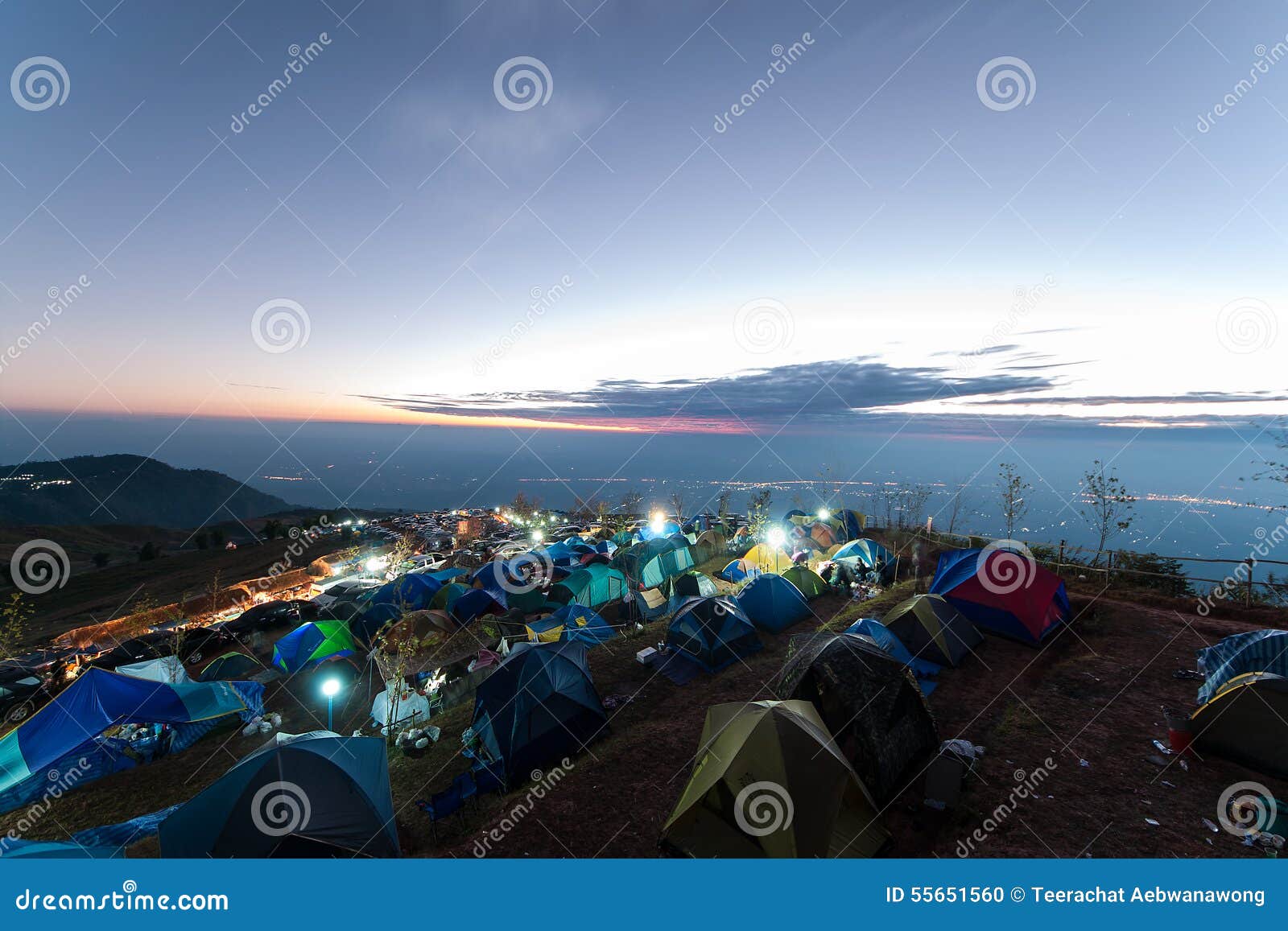 Camping on the big mountain in Phu Tub berk of Thailand as tourist style with sunrise sky , Thailand.