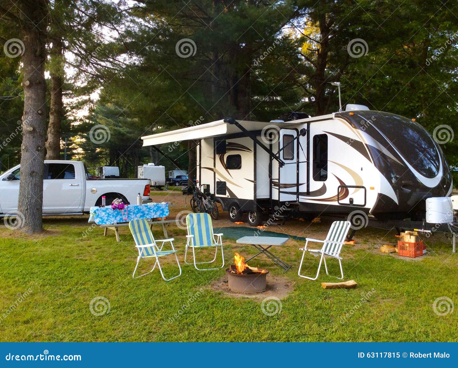 camping on the campground with travel trailer