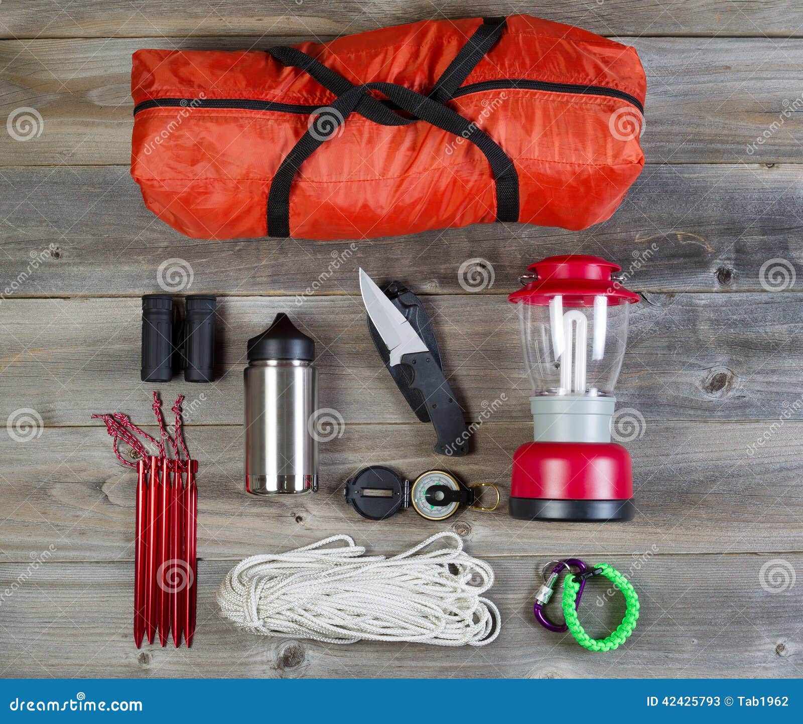 Camping Gear on Rustic Wooden Boards Stock Image - Image of clip