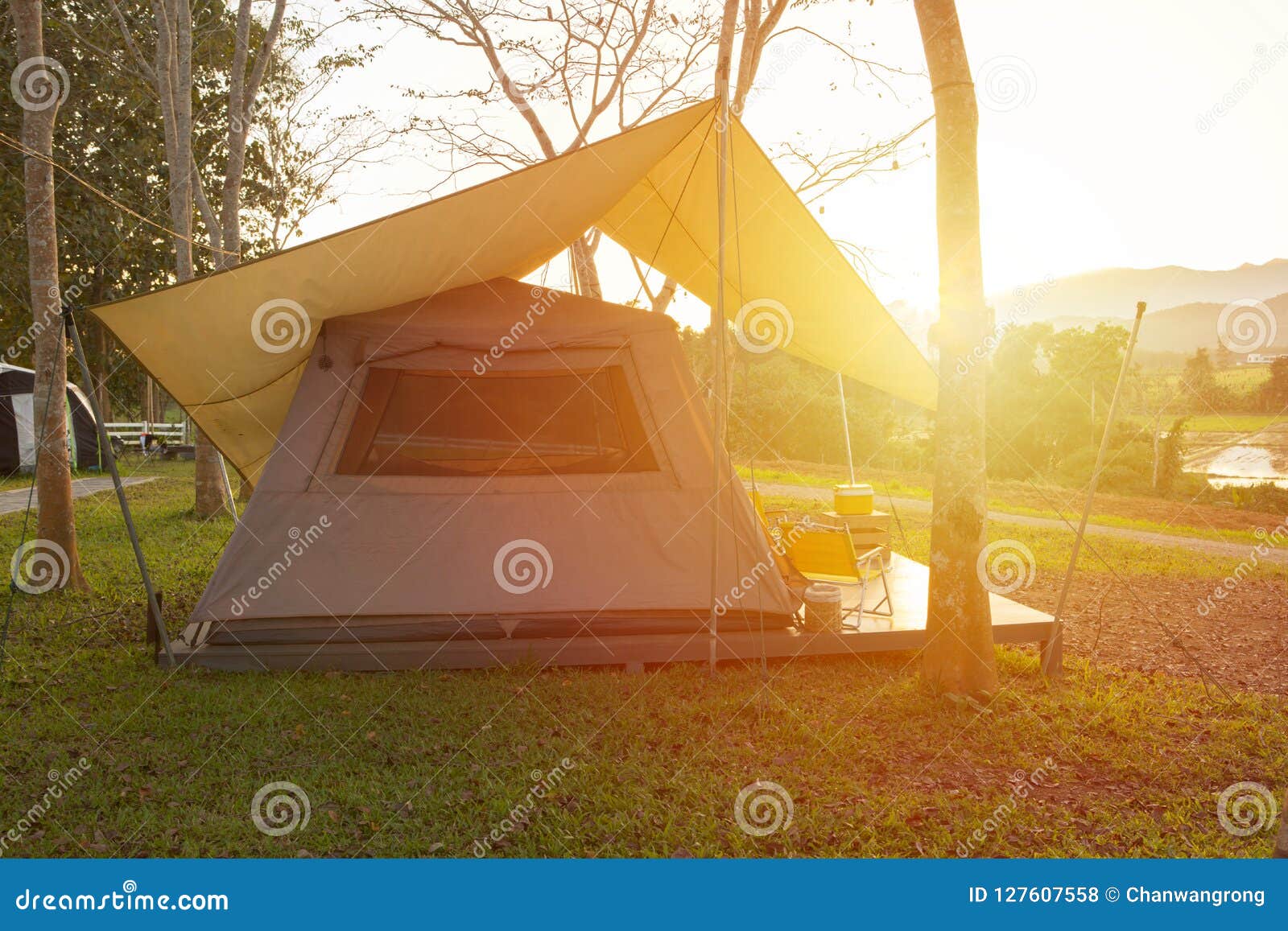 Camping Tent with Beautiful Sunlight in the Evening Time Stock Photo