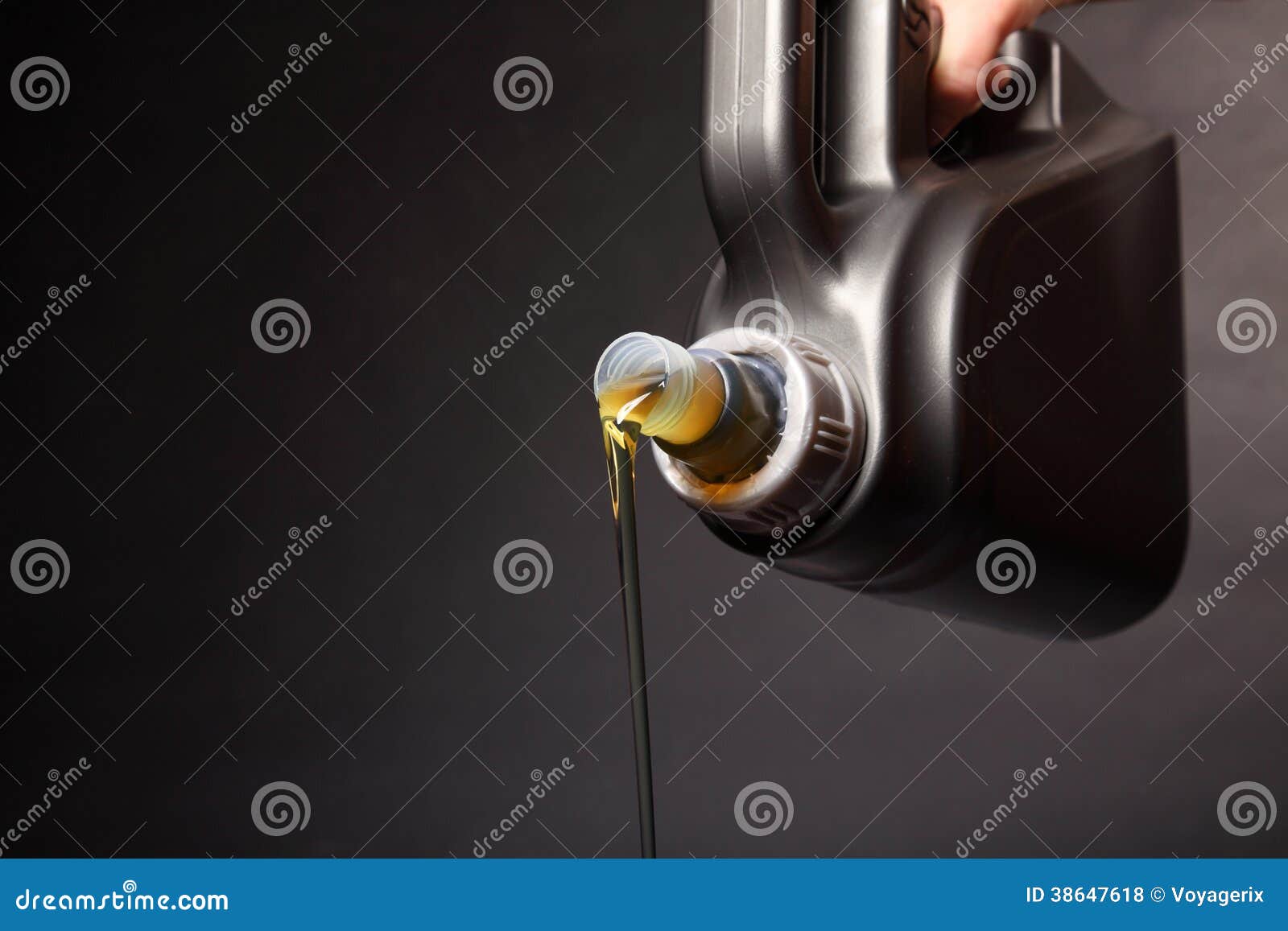 Can with Car Engine Oil Pouring on Black Stock Photo Image of black