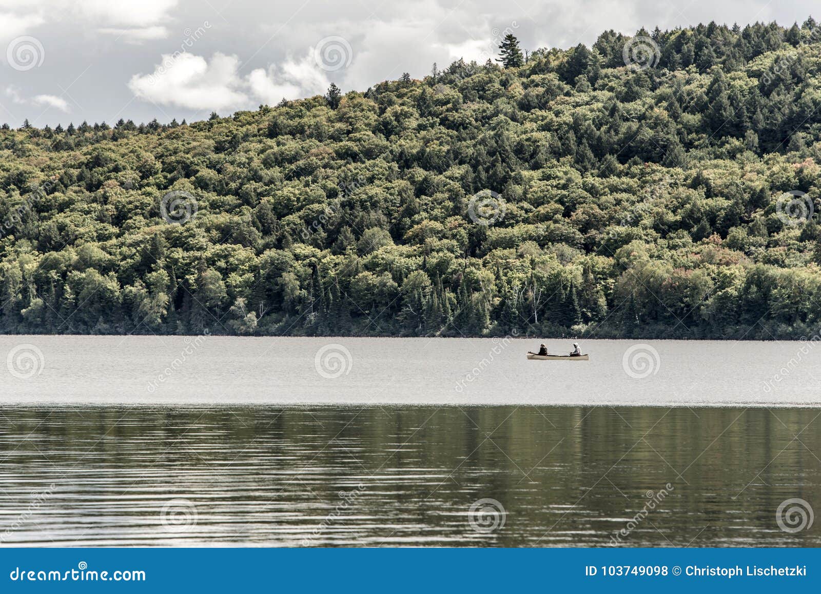 Canada Ontario Lake of two rivers Couple on a Canoe Canoes on the water in Algonquin National Park