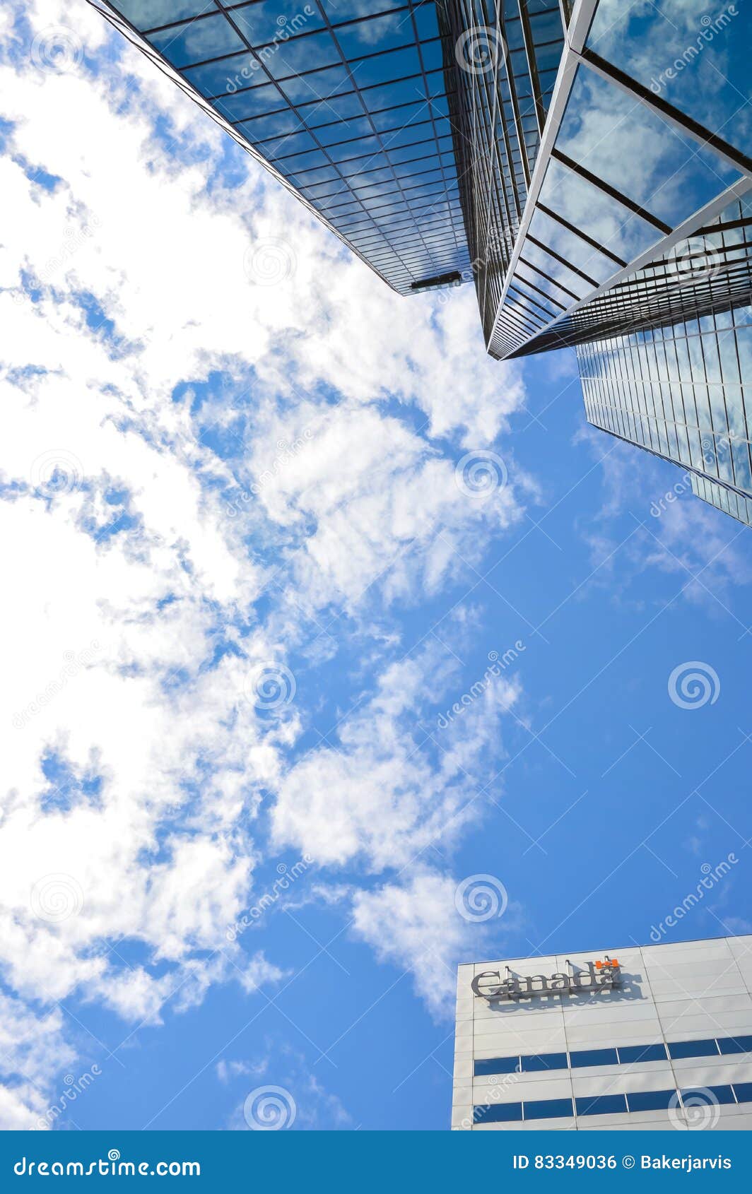 Canada Sign in Front of the Building and a Skyscraper Editorial Photo Image of front