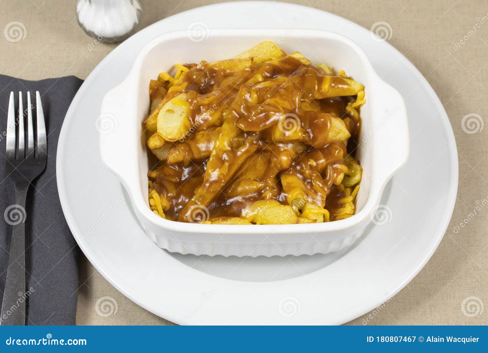 Canadian Dish Poutine Fries, Cheddar and Brown Sauce Stock Image