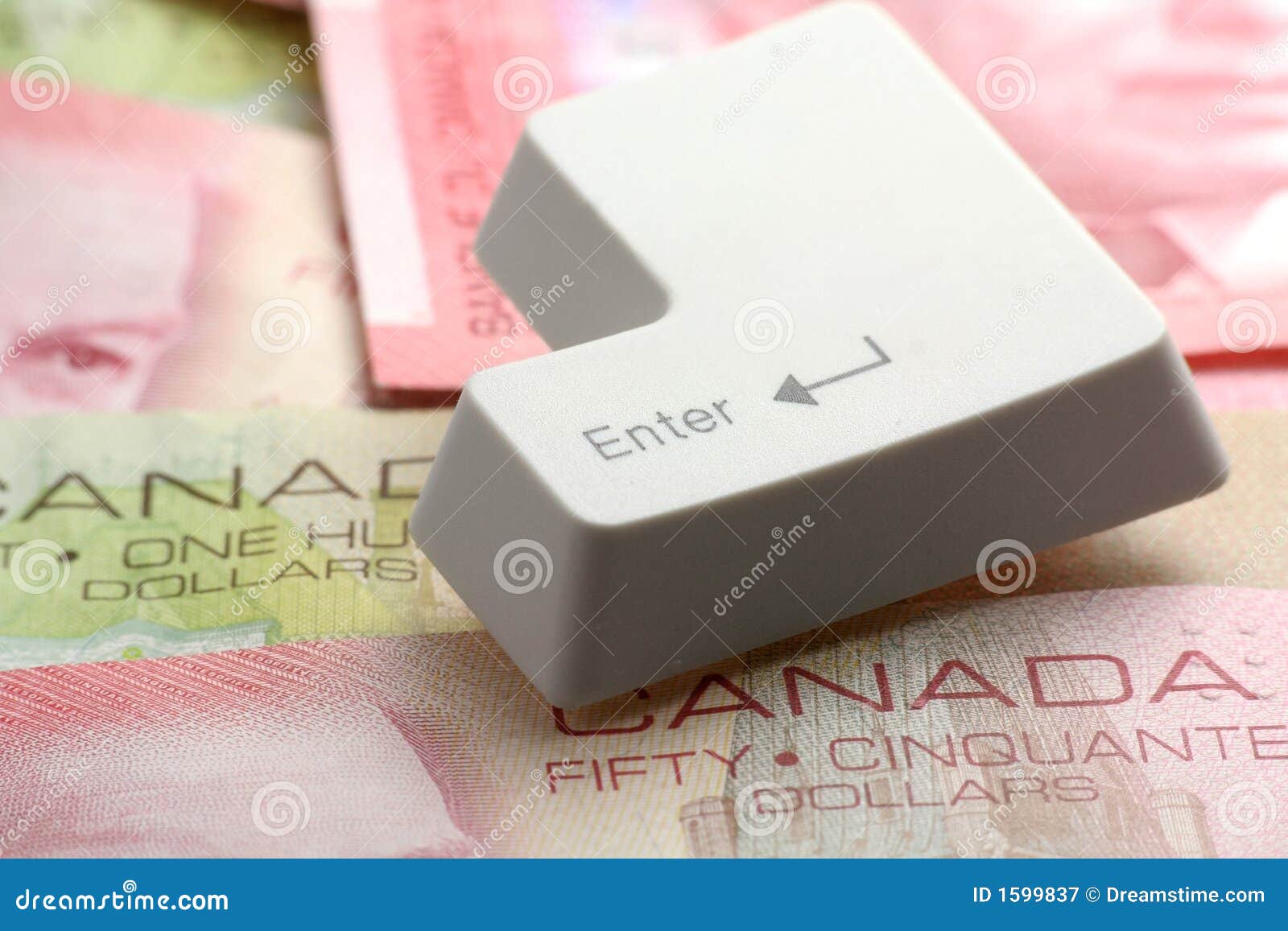 Canadian Dollars and a Enter Key Stock Image Image of computer