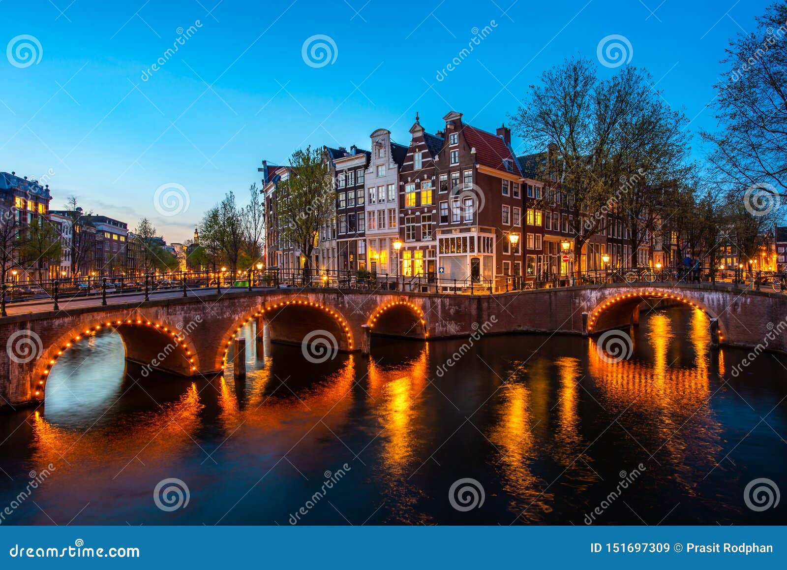 canals of amsterdam at night. amsterdam is the capital and most populous city of the netherlands
