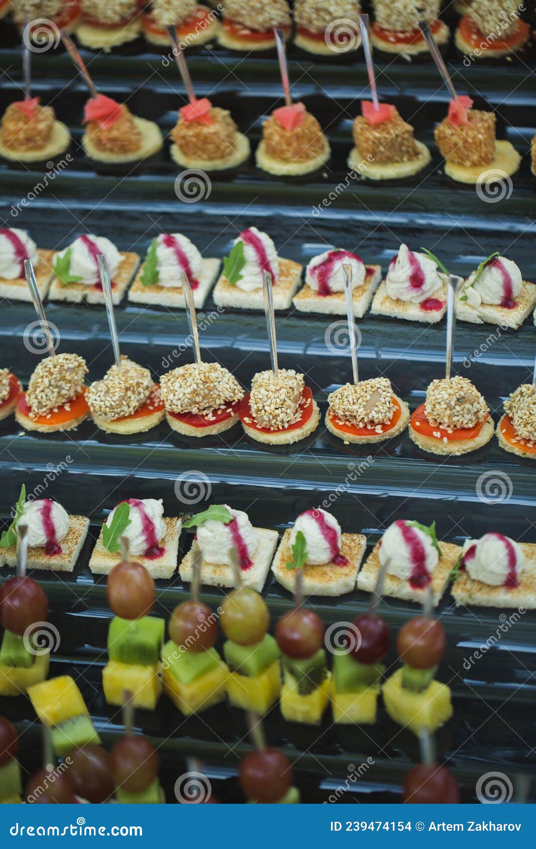 Canapes of Cheese Vegetables Meat and Seafood. Buffet Table. Stock