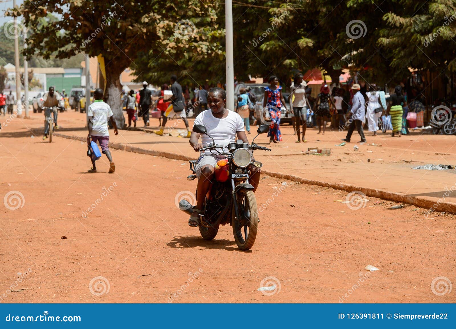 Unidentified Local Man Rides a Motorcycle in the Centre of Canc ...
