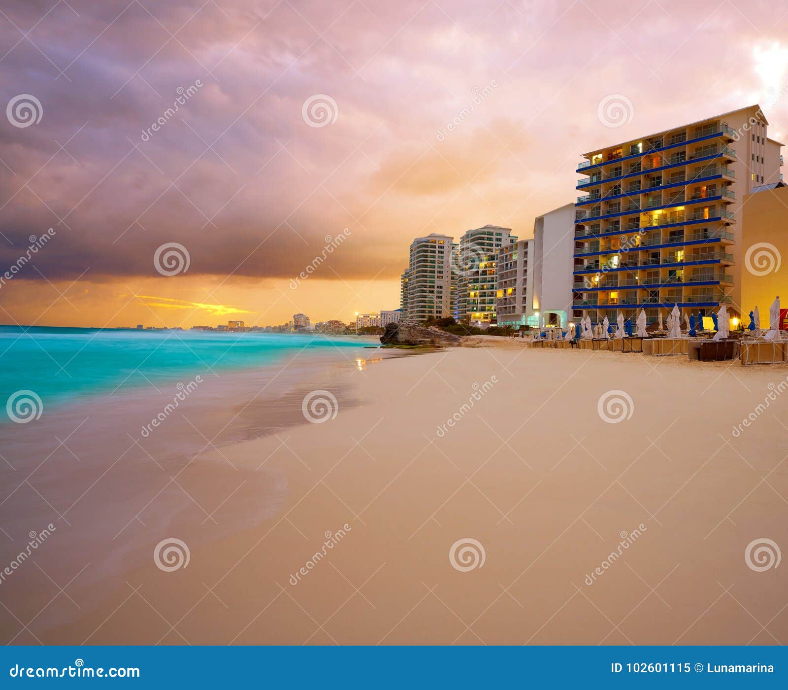cancun forum beach sunset in mexico