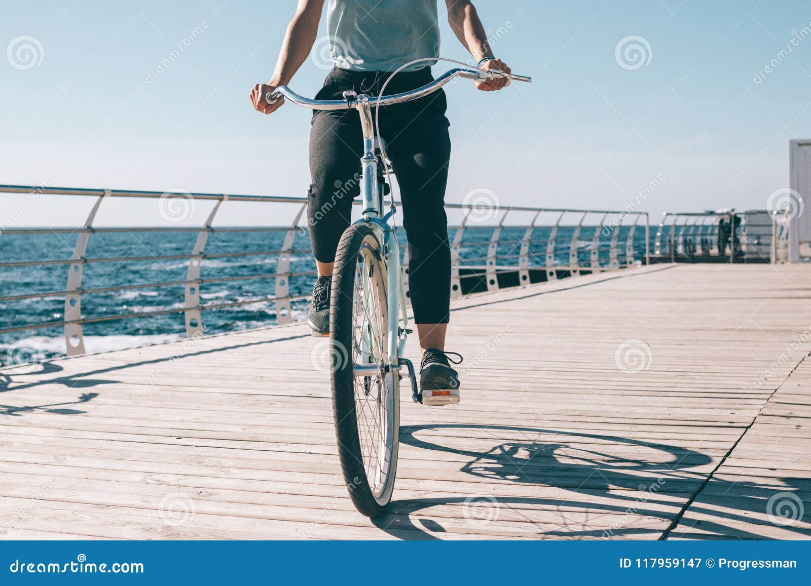 Candid Photo of a Young Woman Riding a Cruiser Bike Stock Image - Image ...