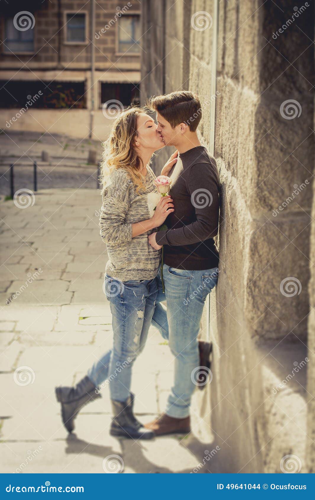 https://thumbs.dreamstime.com/z/candid-portrait-beautiful-european-couple-rose-love-kissing-street-alley-celebrating-valentines-day-passion-49641044.jpg
